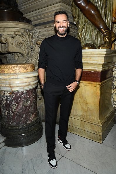 Cyril Lignac assiste au défilé Balmain Vêtement Femme Printemps/Été 2020. | Photo : Getty Images Cyril Lignac assiste au défilé Balmain Vêtement Femme Printemps/Été 2020. | Photo : Getty Images