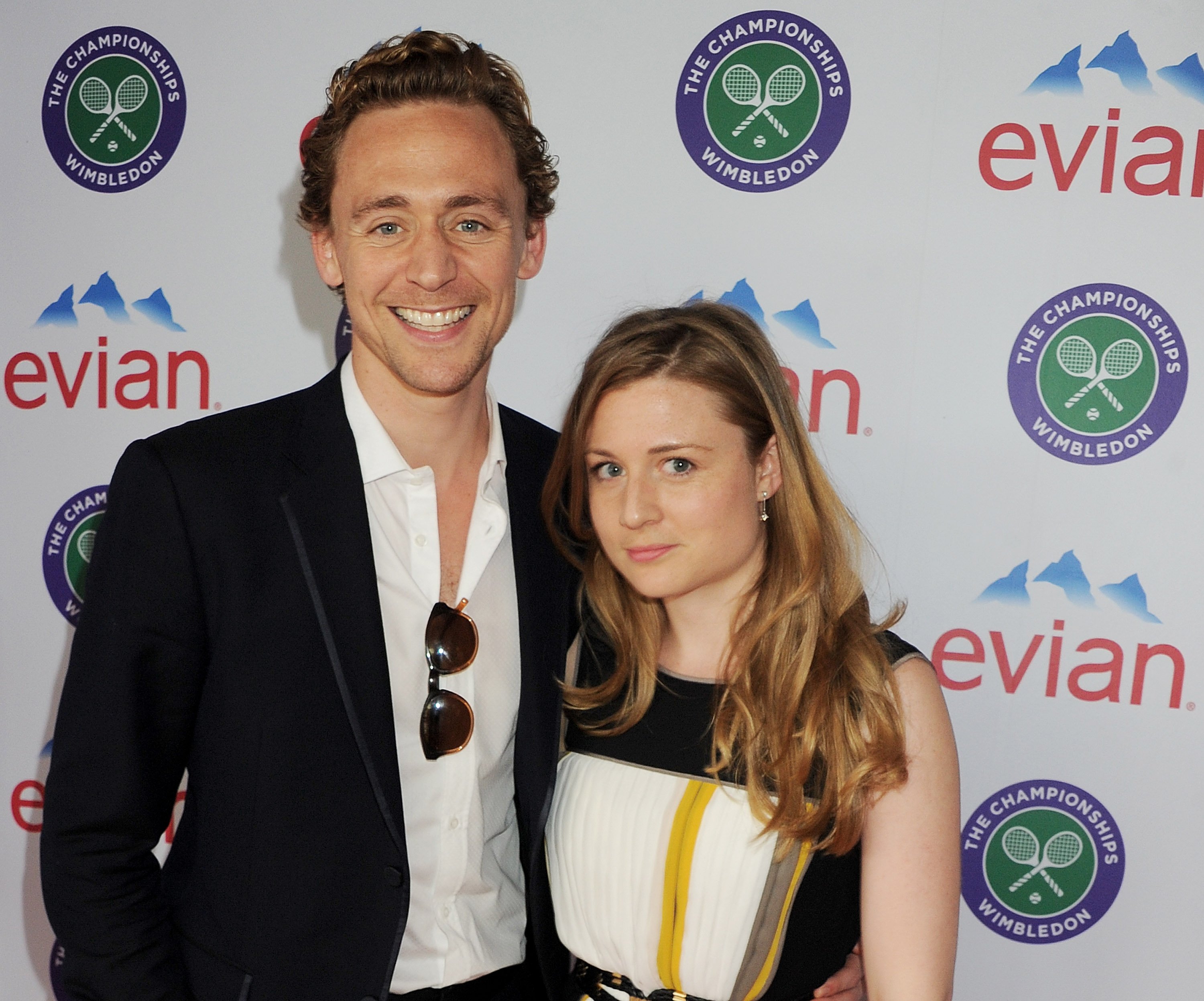 Tom Hiddleston and Emma Hiddleston at the evian “Live young" VIP Suite at Wimbledon on June 25, 2012 in London. | Source: Getty Images
