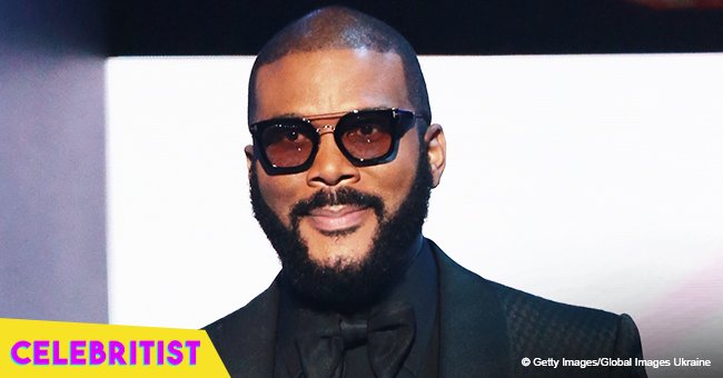 Tyler Perry's longtime lady love flaunts slim curves in black ruffled mini-dress in pic