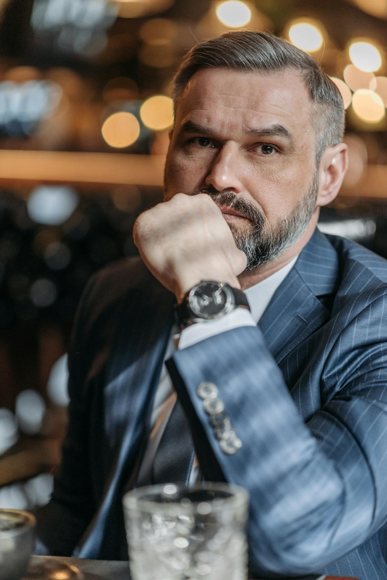 An elegant businessman in a suit | Source: Pexels