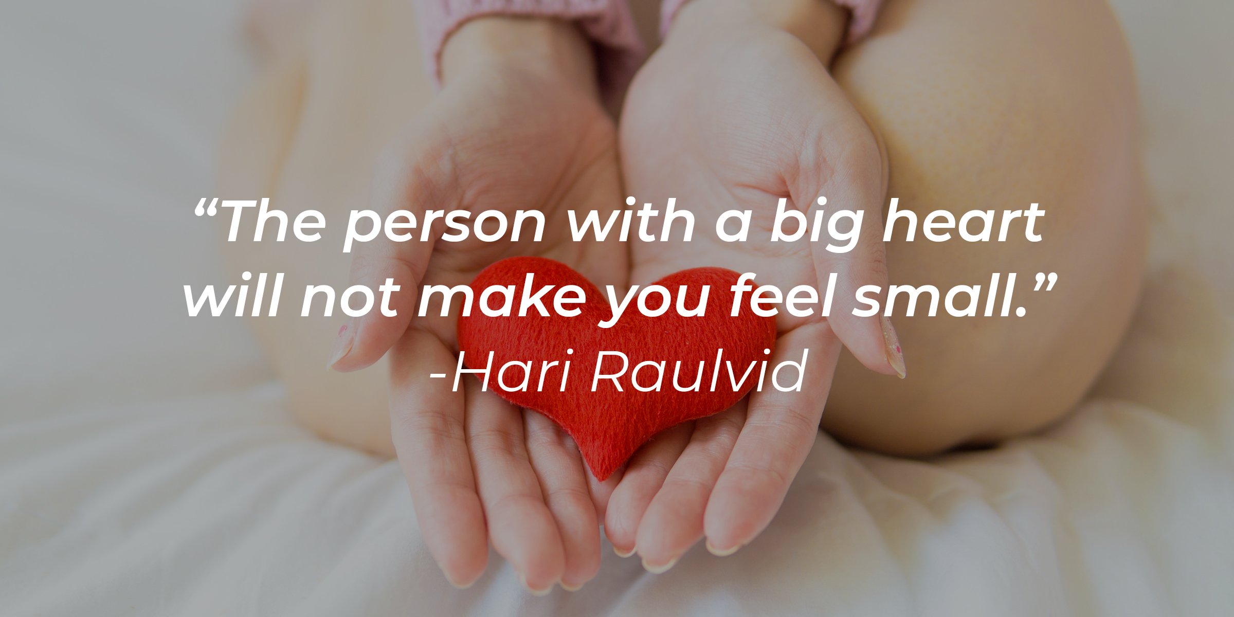 Source: Pexels | Hand holding a heart shape with the quote: "The person with a big heart will not make you feel small."