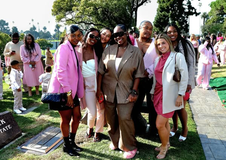 Friends and family embrace Cori Broadus during the memorial service for baby Codi Dreaux, from a post dated February 9, 2026. | Source: Instagram/princessbroadus