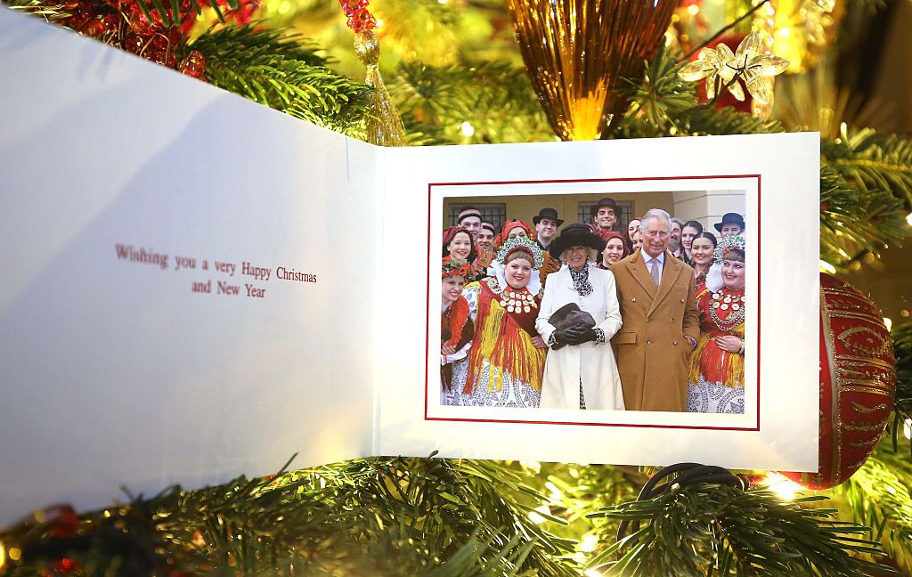 The Prince of Wales and Duchess of Cornwall's 2016 Christmas card on a Christmas tree in Clarence House. | Source: Getty Images