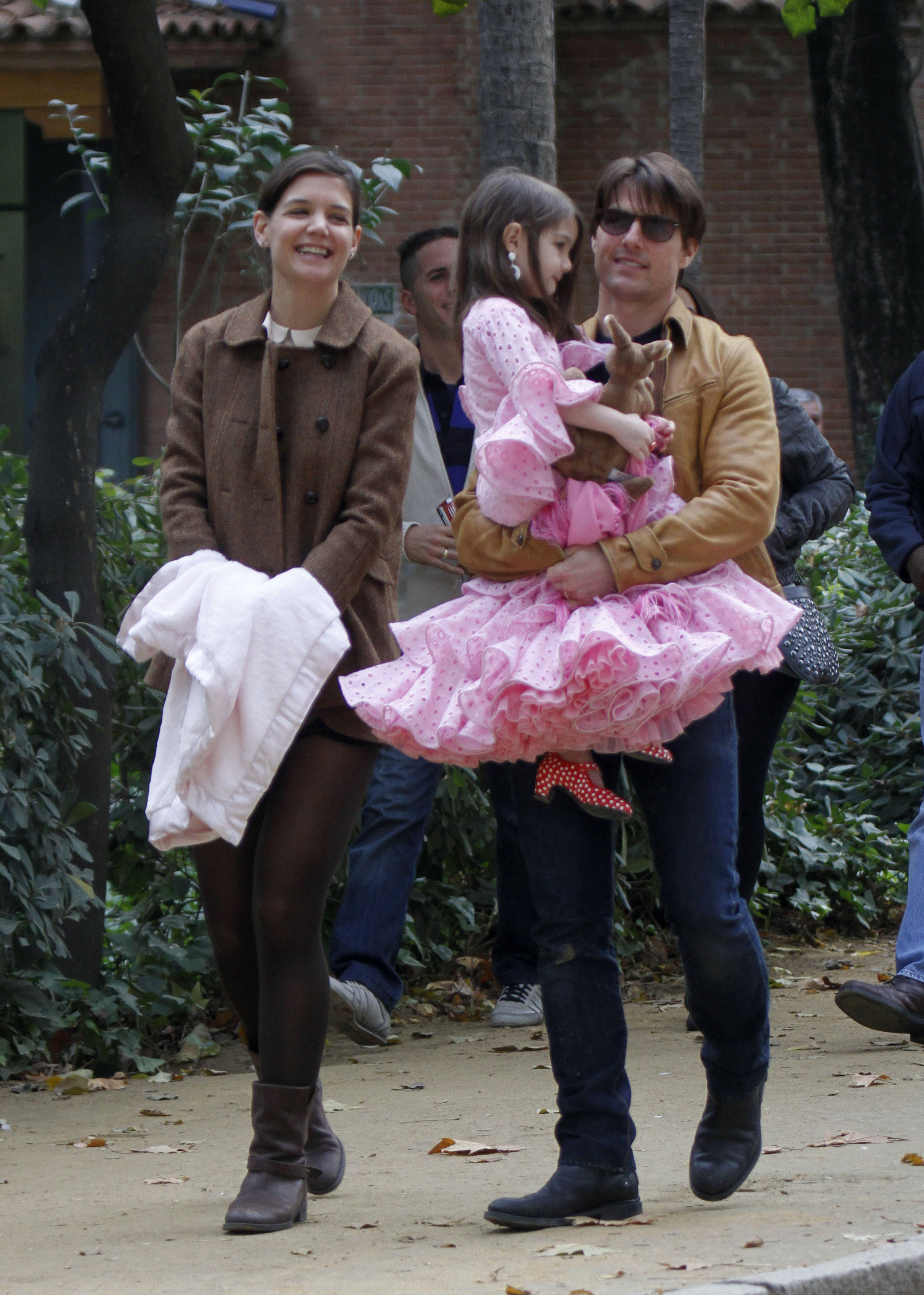 Tom Cruise and Katie Holmes, with their daughter Suri in Spain in 2009 | Source: Getty Images