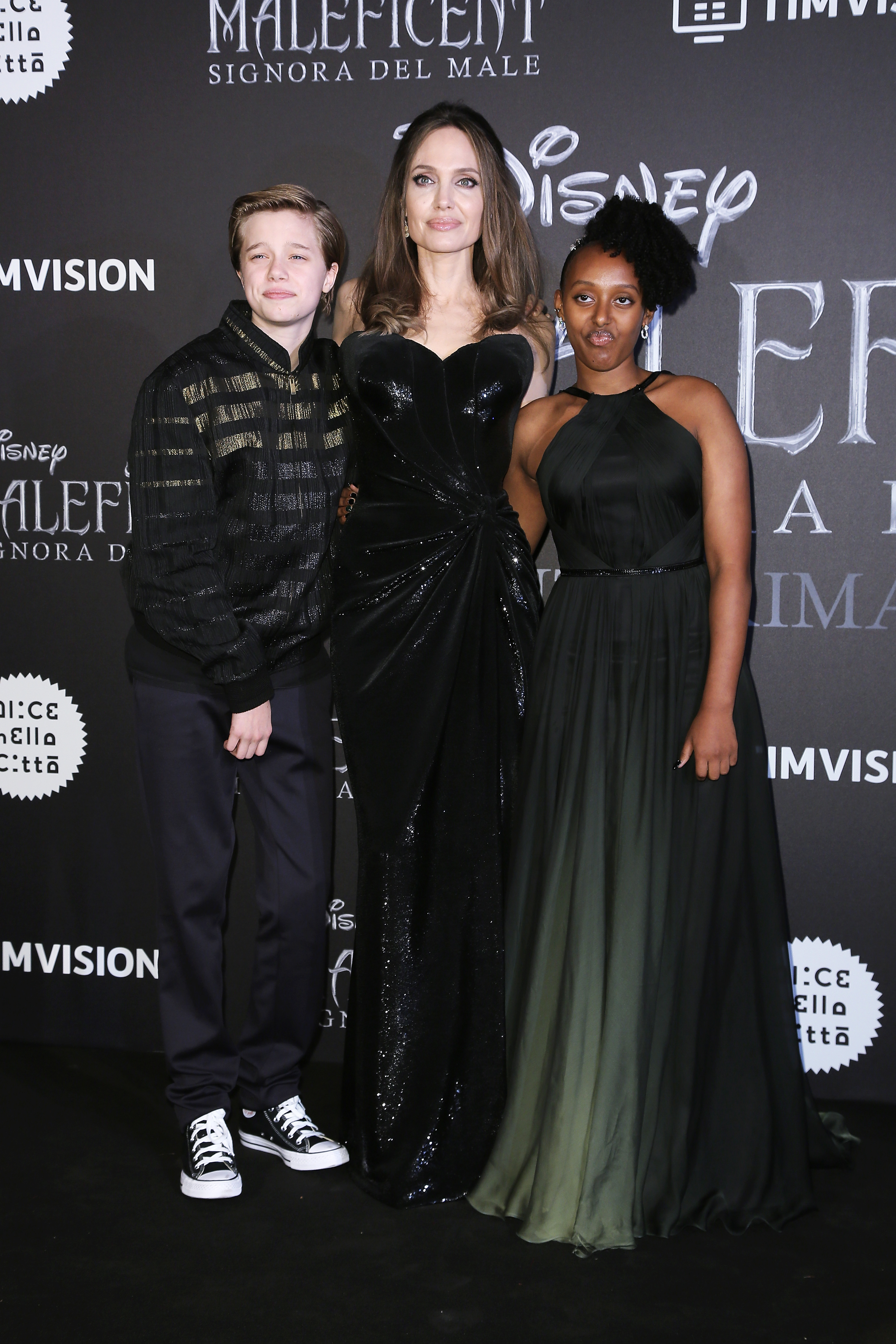 Shiloh Nouvel Jolie-Pitt, Angelina Jolie and Zahara Marley Jolie-Pitt attend the european premiere of the movie "Maleficent – Mistress Of Evil" on October 7, 2019 in Rome, Italy. | Source: Getty Images