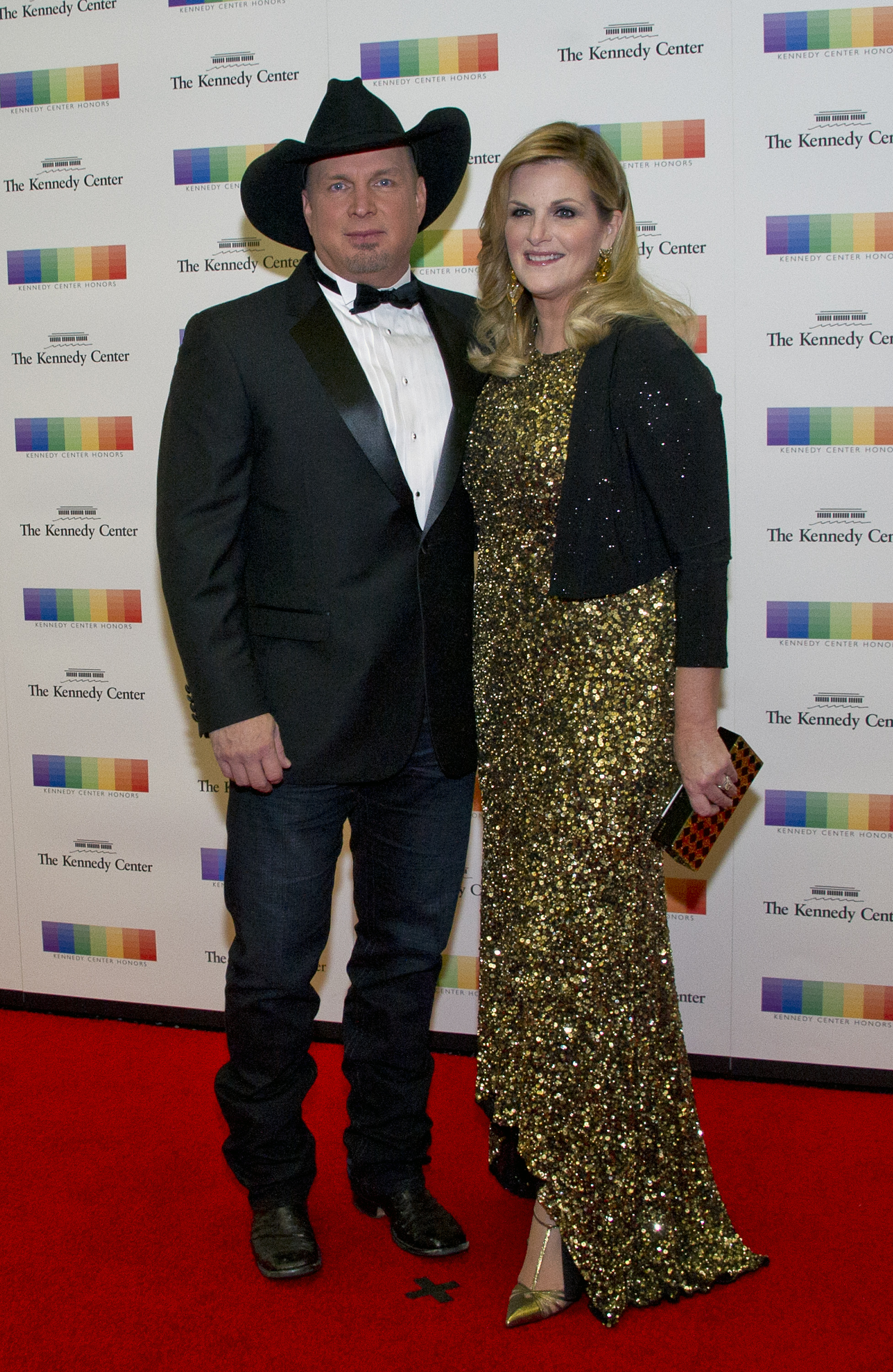 Garth Brooks and Tricia Yearwood arrive for the formal Artist's Dinner honoring the recipients of the 39th Annual Kennedy Center Honors at the U.S. Department of State in Washington, D.C., on December 3, 2016. | Source: Getty Images