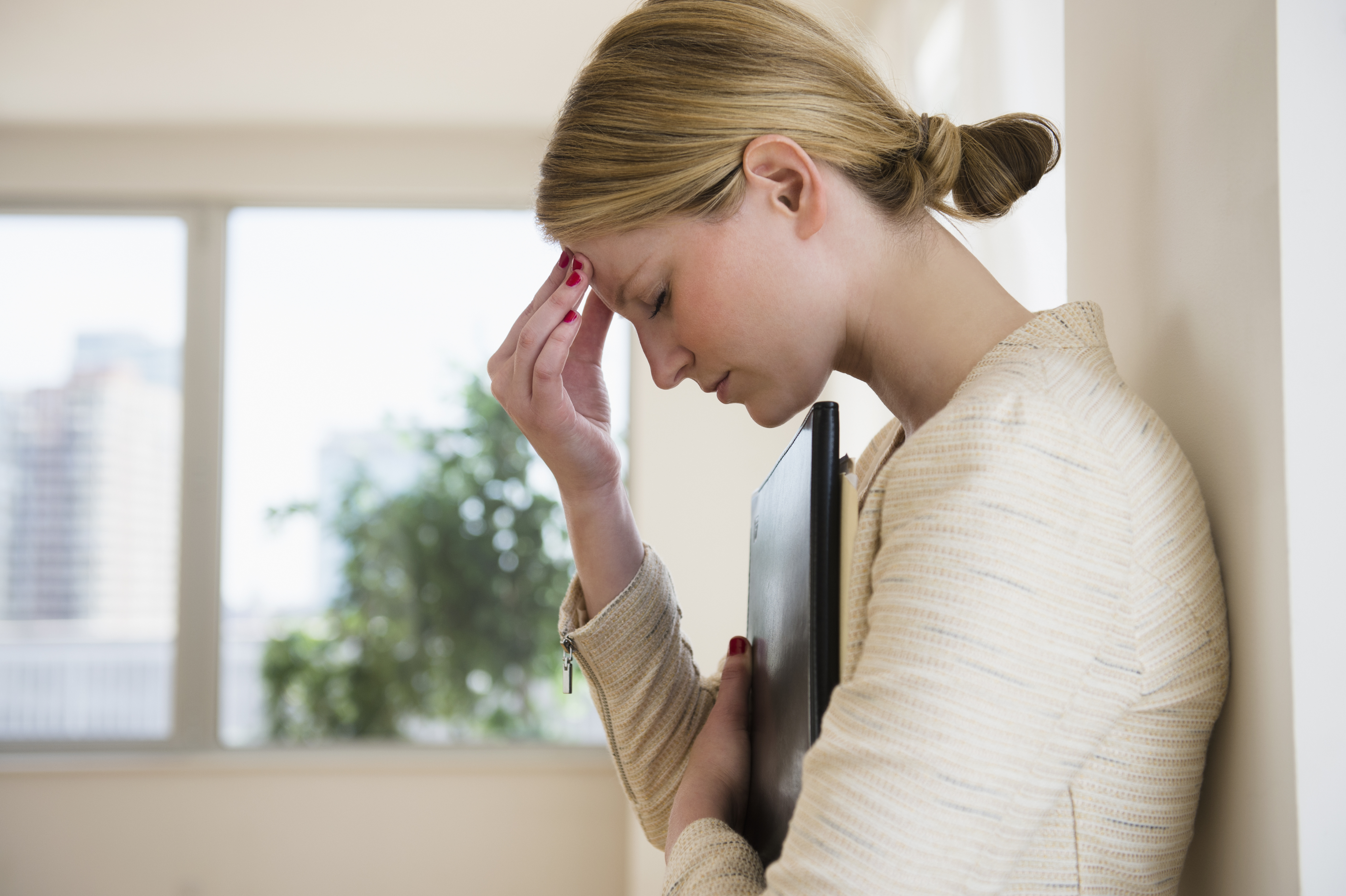 Businesswoman with headache | Source: Getty Images