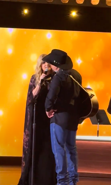 Trisha Yearwood and Garth Brooks singing "Golden Ring" together, posted on March 20, 2025. | Source: TikTok/@musicmayhemmagazine.com