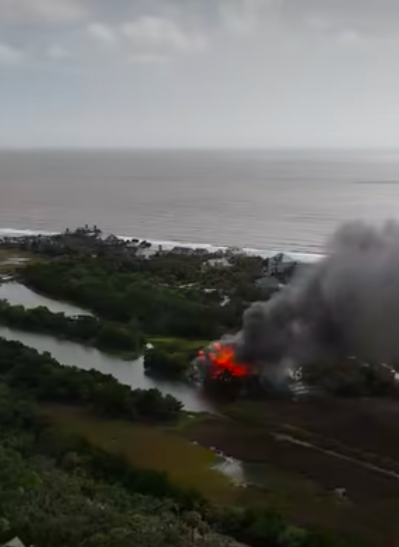 The black plumes of smoke emerging from the raging fire that engulfed Judge Diane Goodstein's home, posted on October 4, 2025. | Source: Facebook/Robby Borden