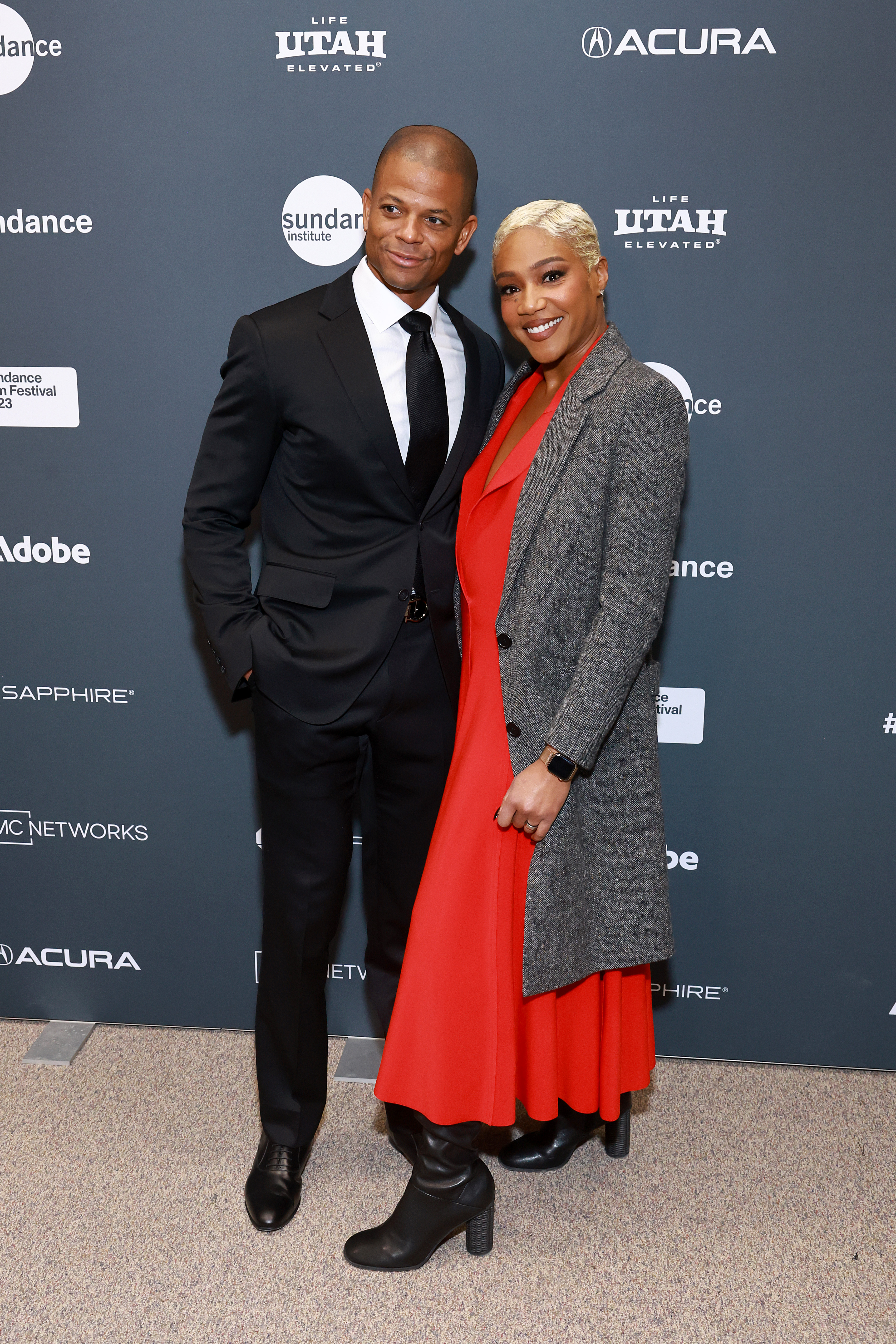 Marvin Jones and Tiffany Haddish at the 2023 Sundance Film Festival "Landscape With Invisible Hand" premiere in Park City, 2023 | Source: Getty Images
