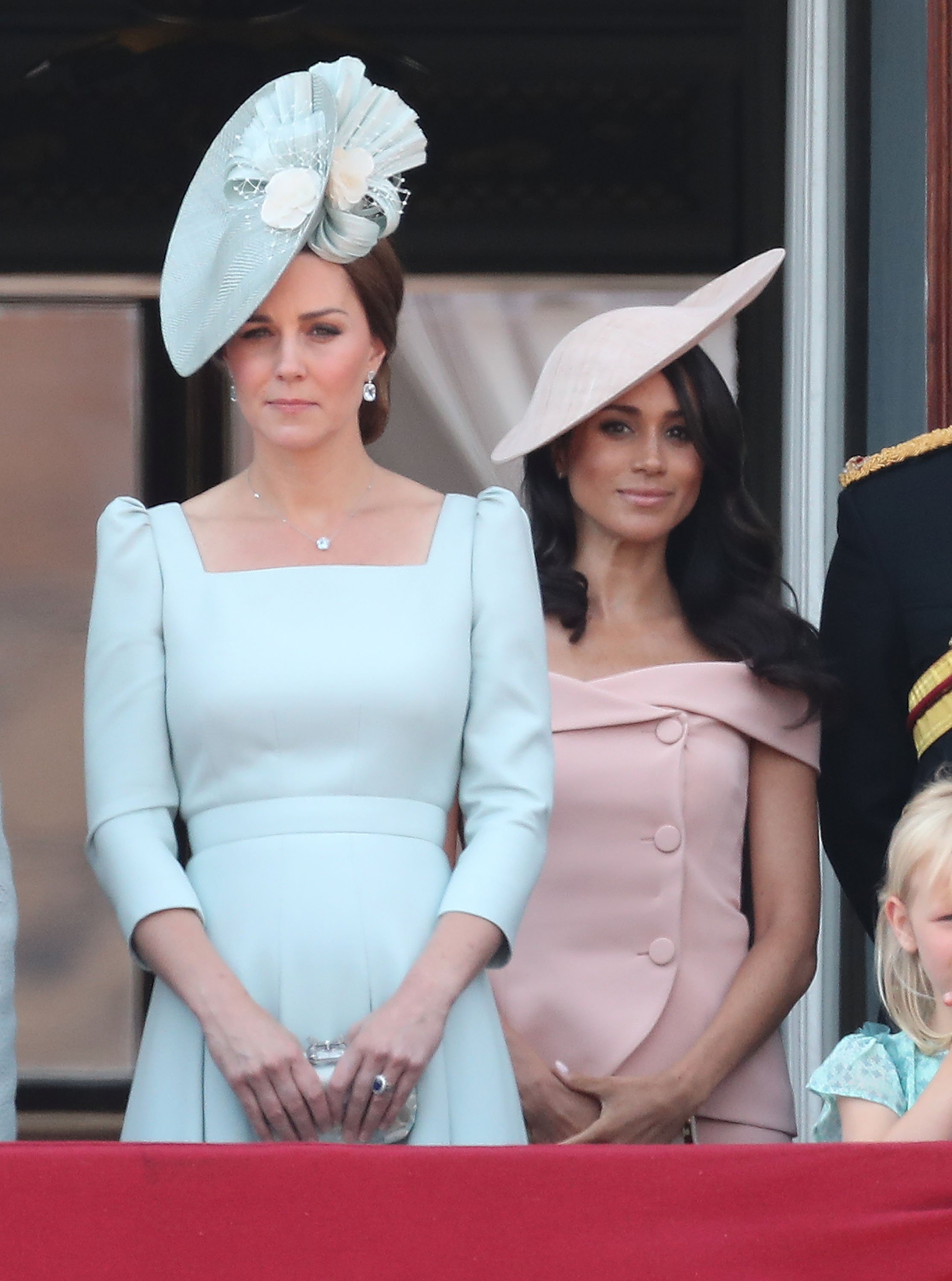 Catherine, Duchess of Cambridge and Meghan, Duchess of Sussex on the balcony of Buckingham Palace during Trooping The Colour on June 9, 2018 in London, England | Source: Getty Images 