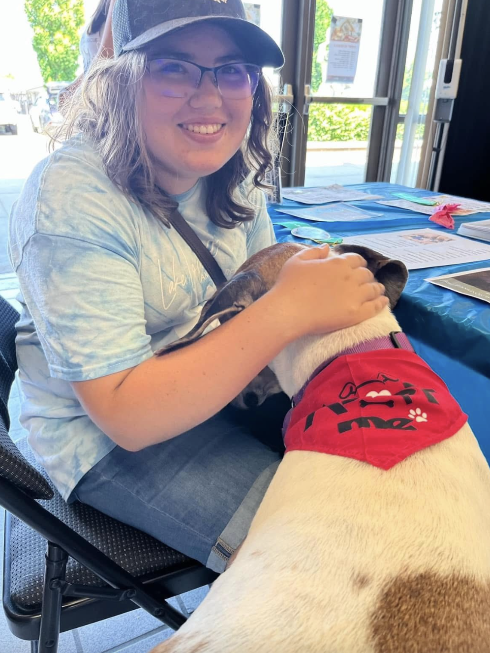 Serena Bennett looks happy while patting a rescue animal, dated May 21, 2025 | Source: Facebook/Lakelowellanimalrescue