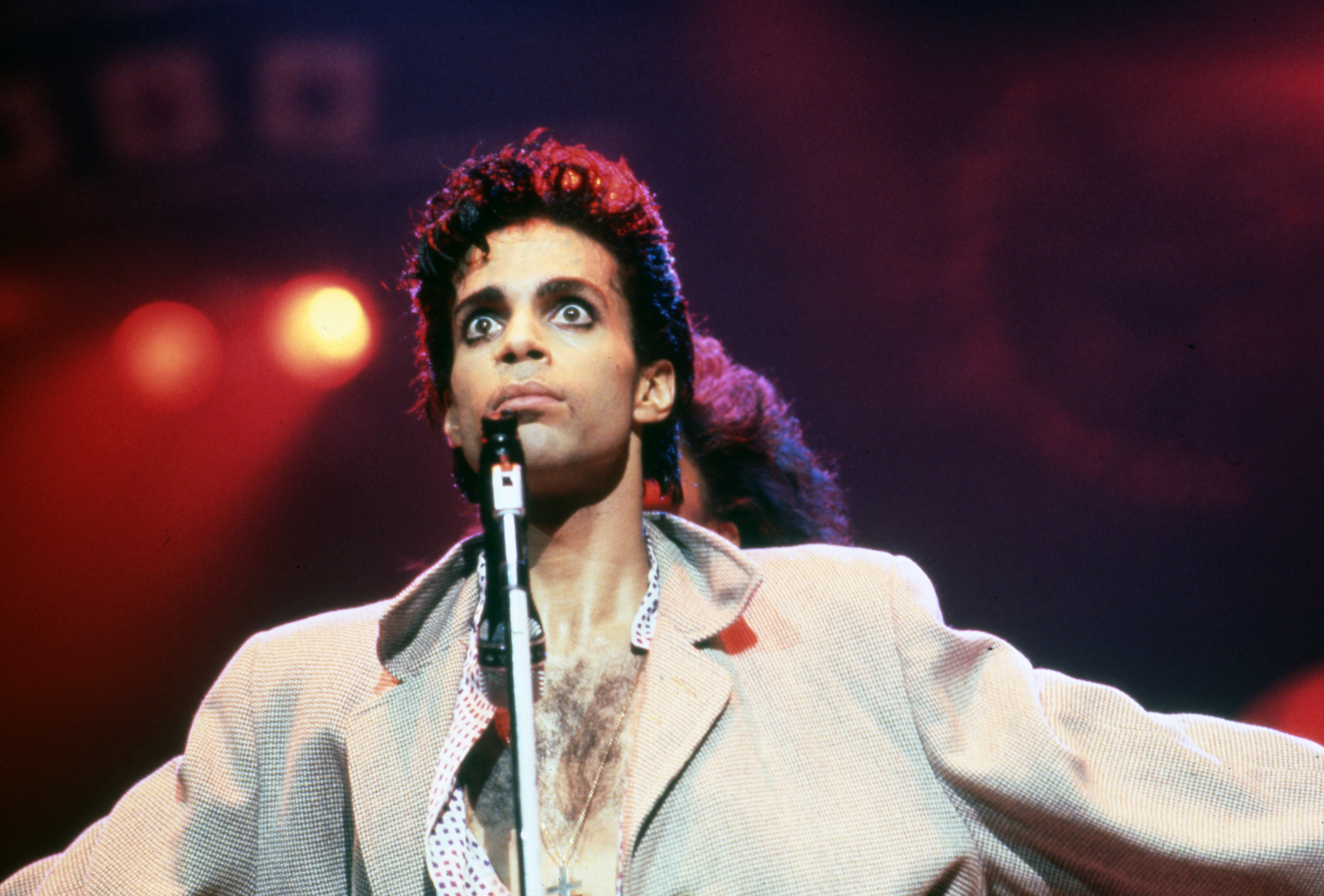 Prince performing onstage during his 1986 Parade Tour on June 7, 1986 in Detroit, Michigan | Source: Getty Images