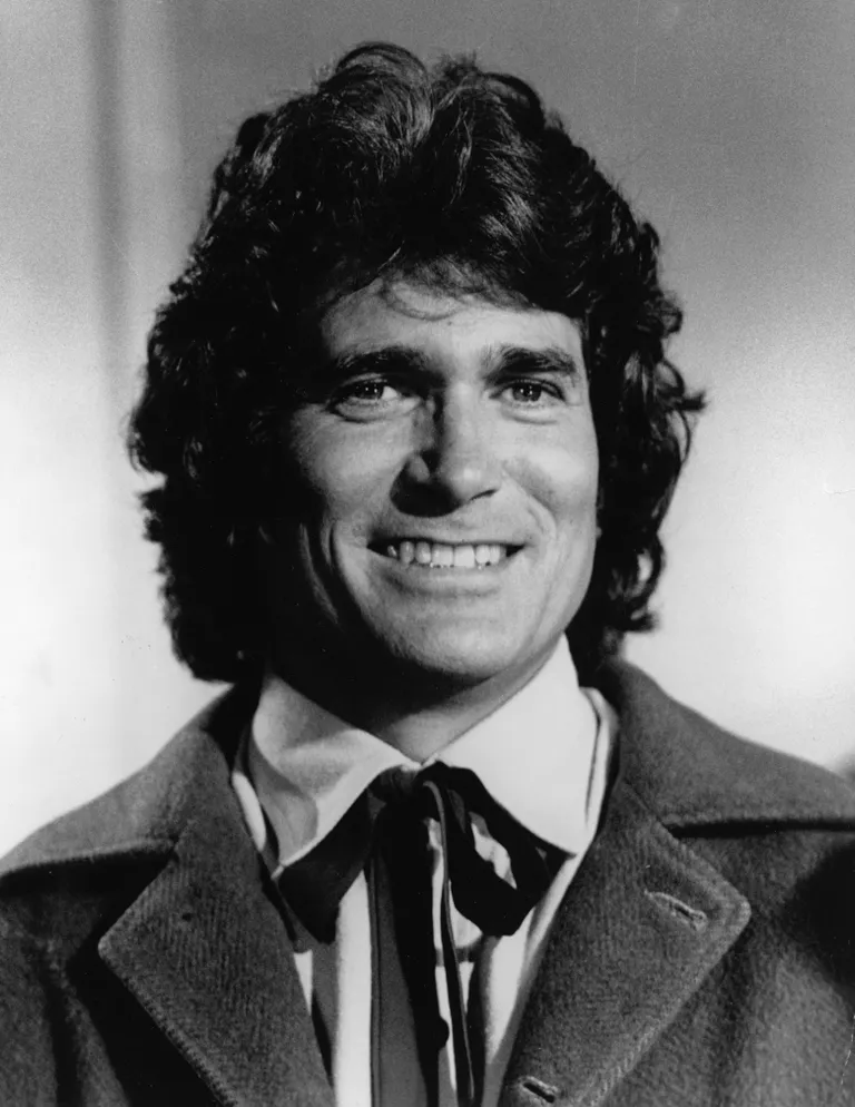 Headshot of American actor Michael Landon smiling in costume from the television series, "The Little House On The Prairie." | Source: Getty Images.