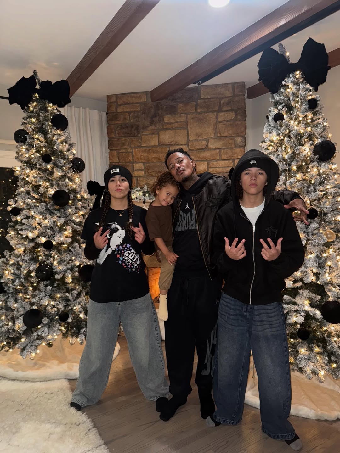 Nick Cannon takes photo with three of his children from a post dated December 1, 2025. | Source: Instagram/nickcannon