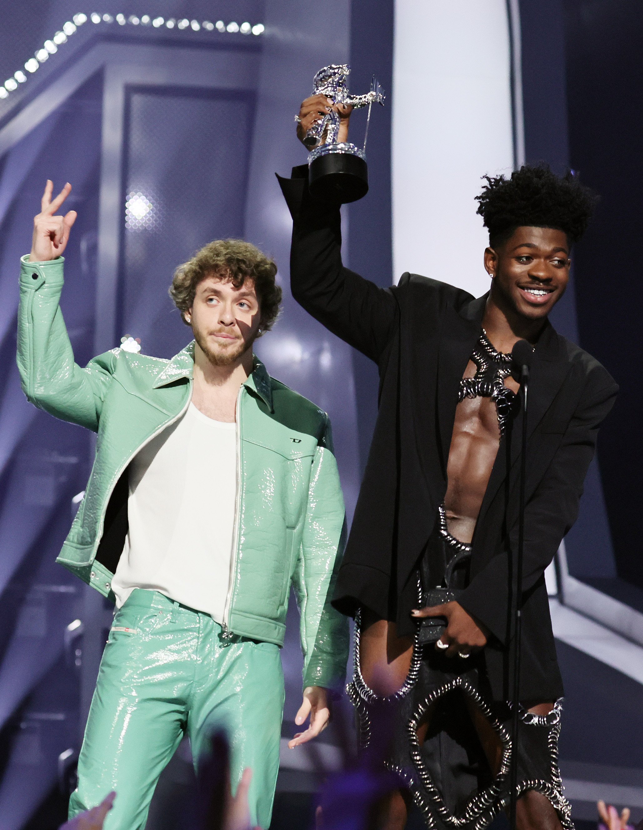 Lil Nas X and Jack Harlow accept an award onstage at the 2022 MTV VMAs at Prudential Center on August 28, 2022, in Newark, New Jersey. | Source: Getty Images