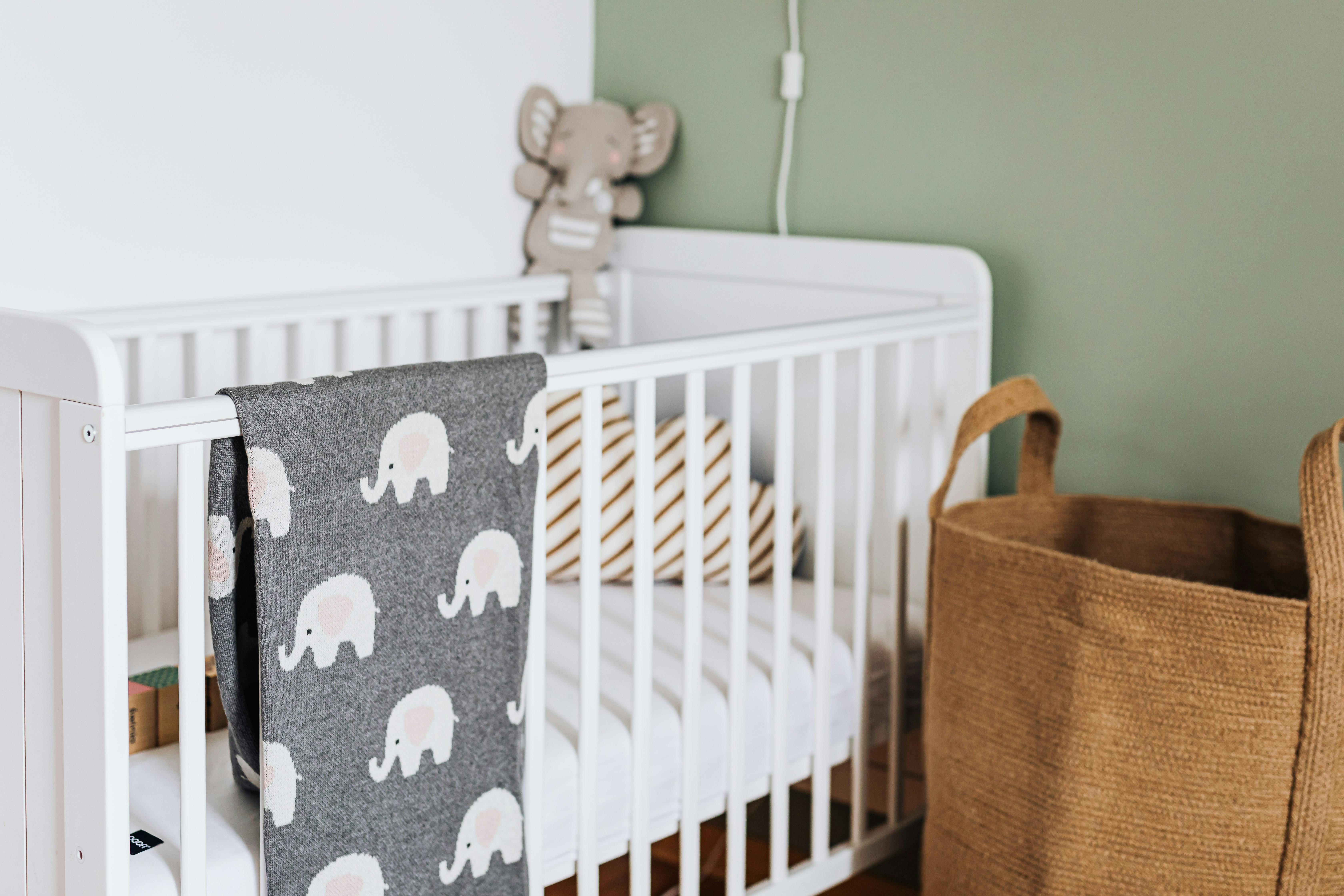 A cot in a baby's nursery | Source: Pexels