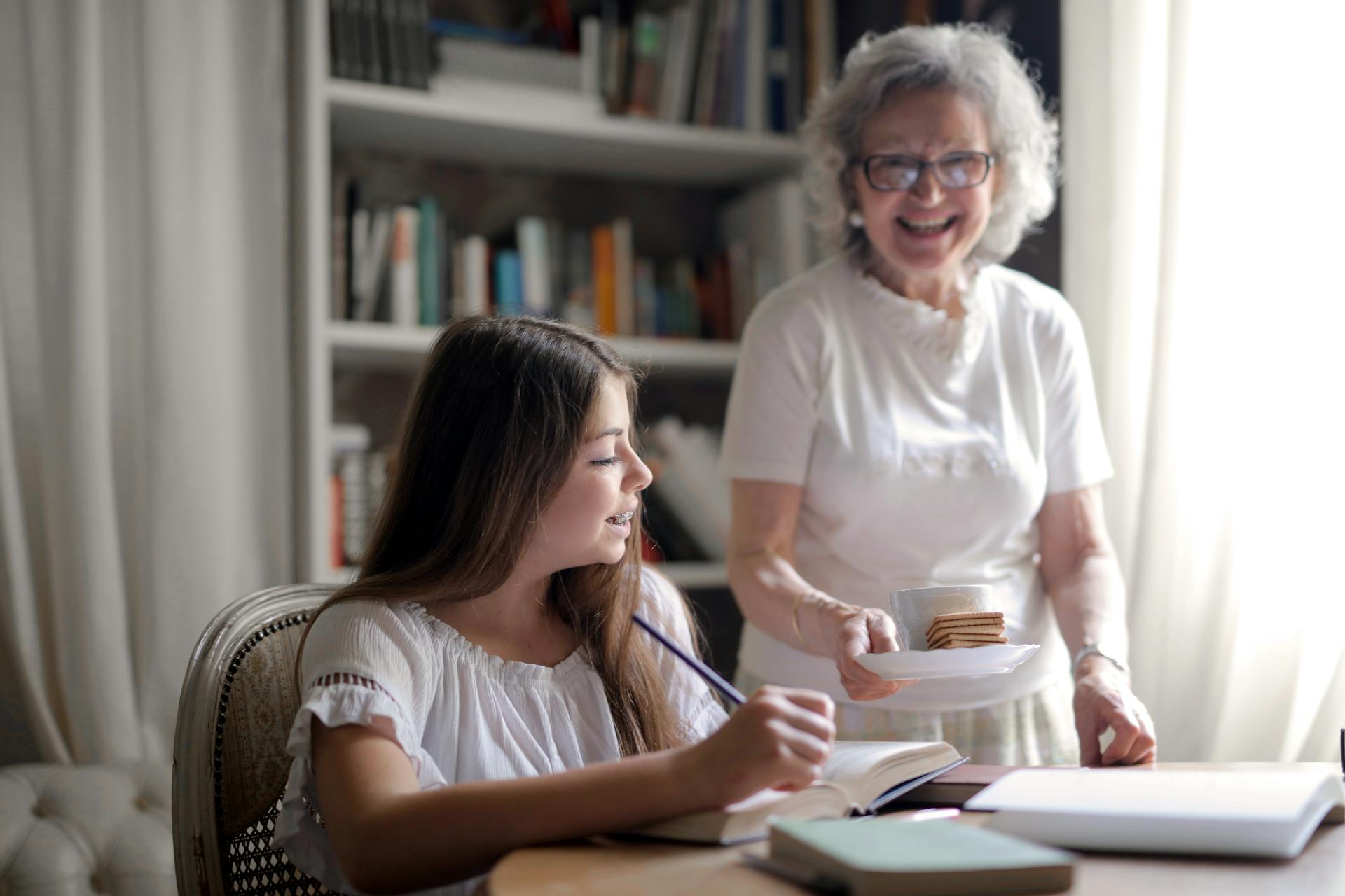 A girl with her grandmother | Source: Pexels