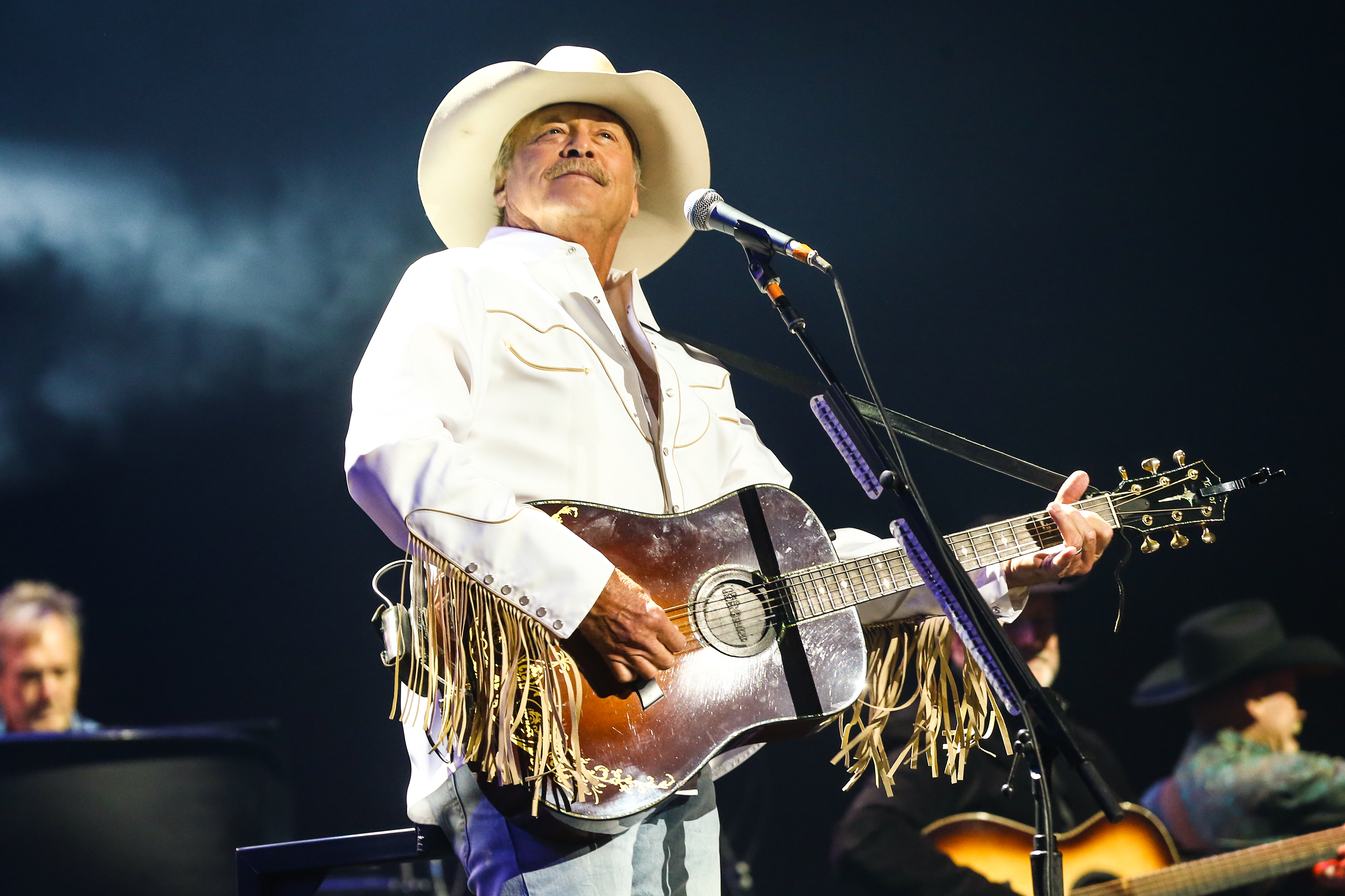 Alan Jackson performs at Bridgestone Arena on October 08, 2021 in Nashville, Tennessee | Source: Getty Images