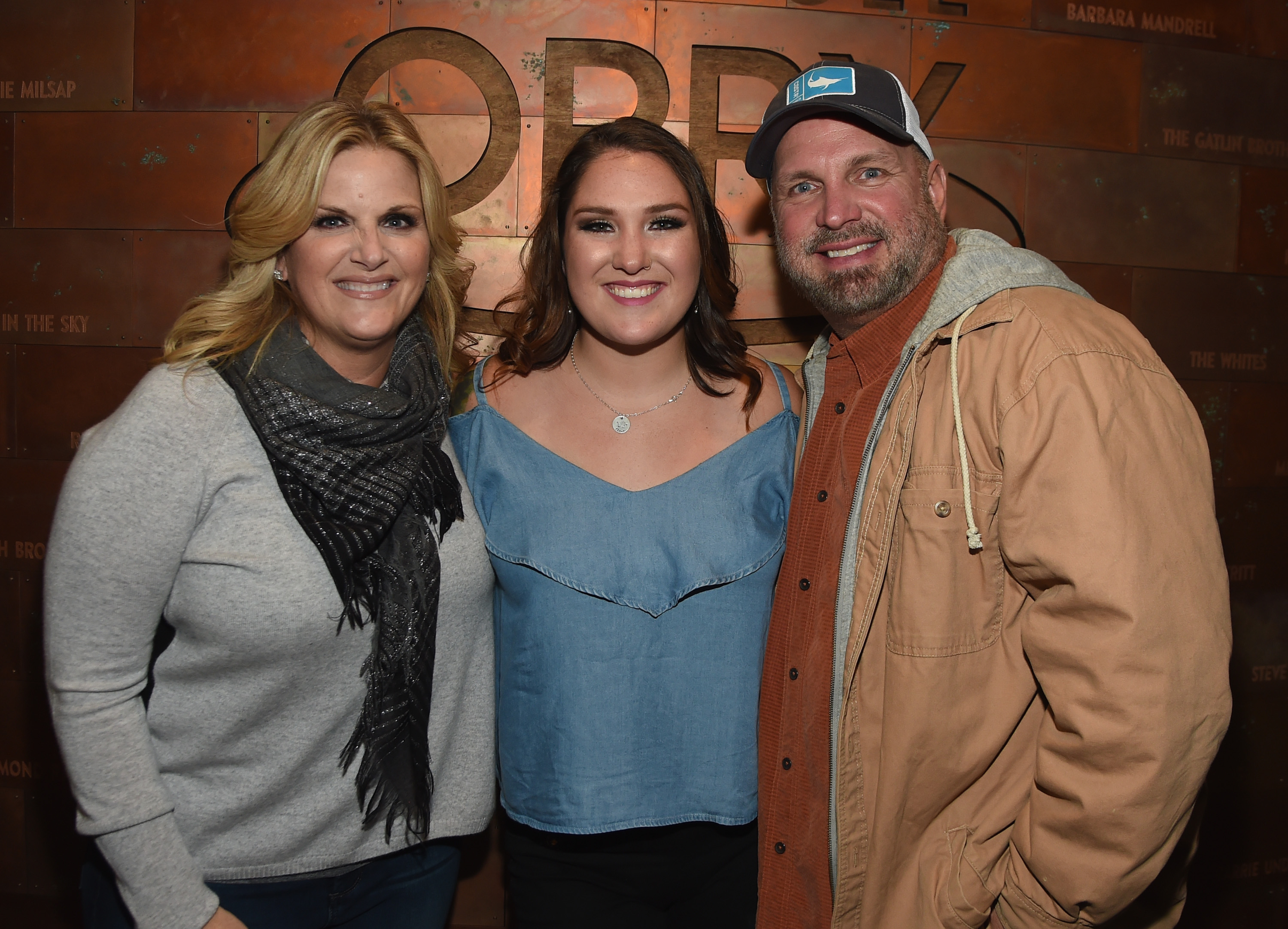 Trisha Yearwood, Allie Colleen Brooks, and Garth Brooks after Allie's Grand Ole Opry debut on October 19, 2017, in Nashville, Tennessee. | Source: Getty Images