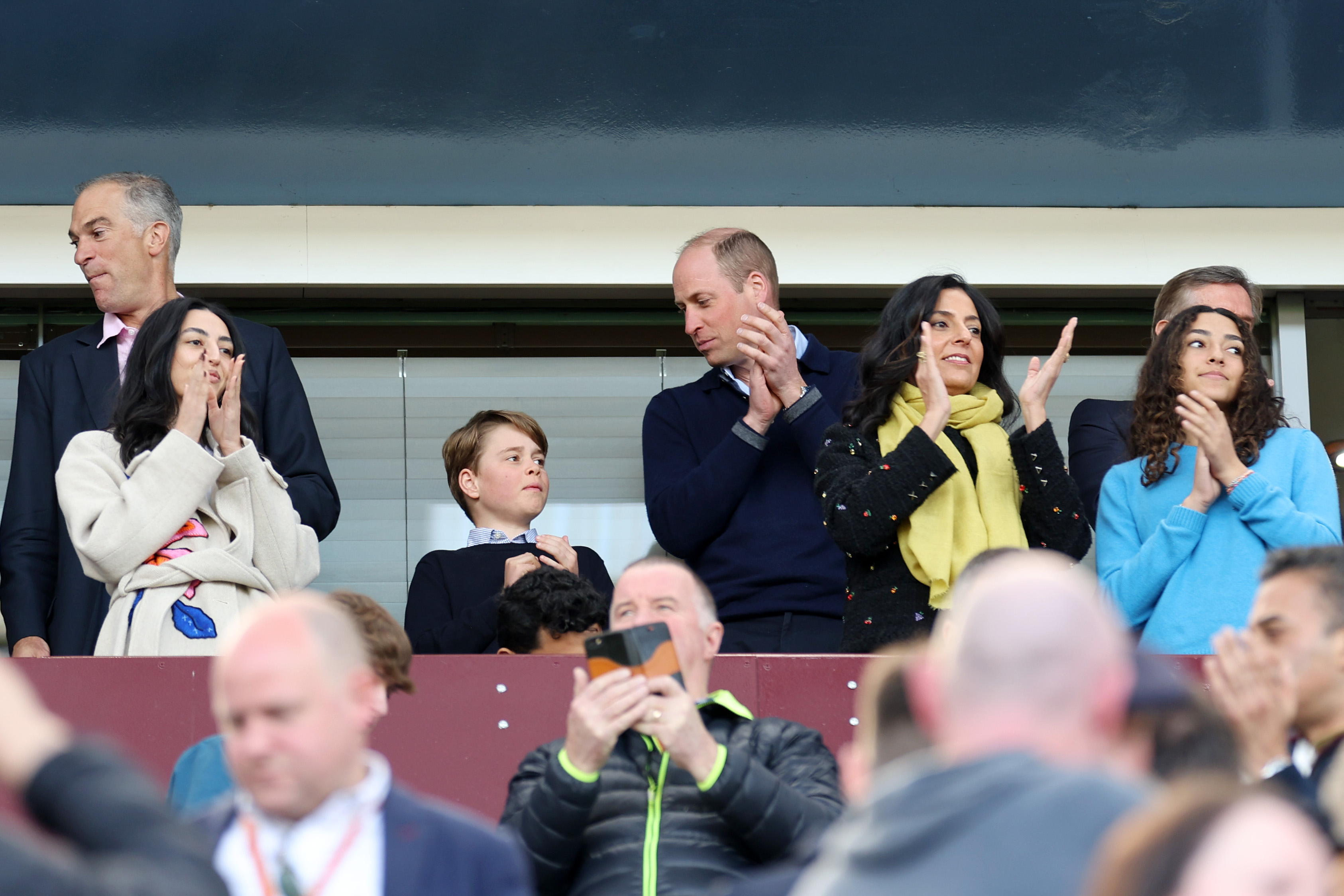 Nassef Sawiris, Chairman of Aston Villa, William, Prince of Wales, and Prince George of Wales look on prior to the Premier League match between Aston Villa and Nottingham Forest on April 8, 2023, in Birmingham, England | Source: Getty Images