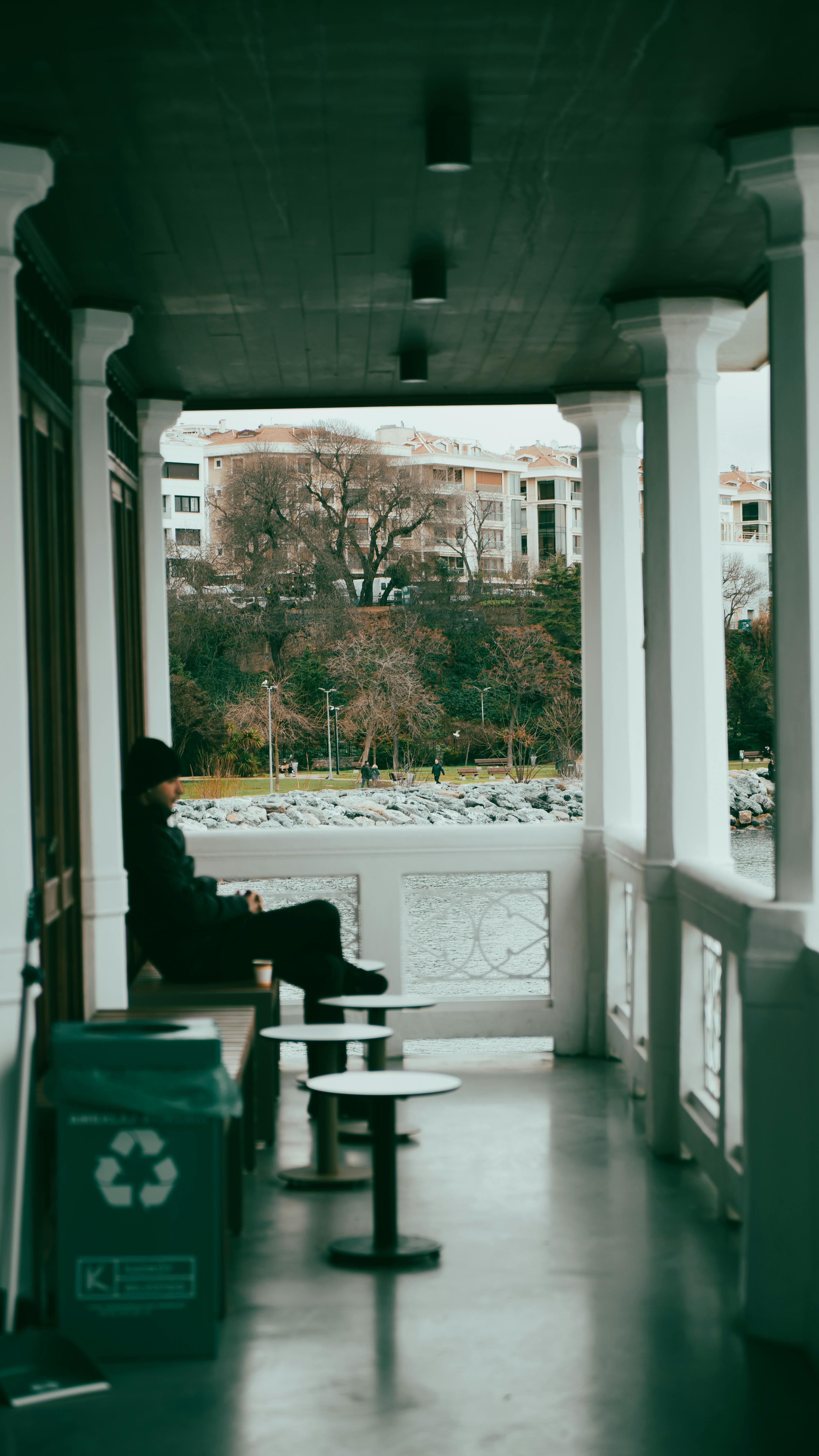 Man seated on the porch | Source: Pexels