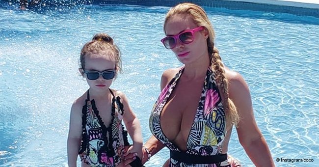 Ice-T’s wife turns heads in a racy bikini as she forms a ‘matching duo’ with her cute daughter