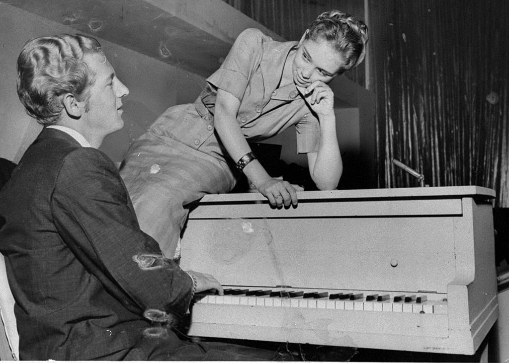 Pianist Jerry Lee Lewis and his 13-year-old bride, Myra, at the Vafe De Paree nightclub | Photo: Getty Images