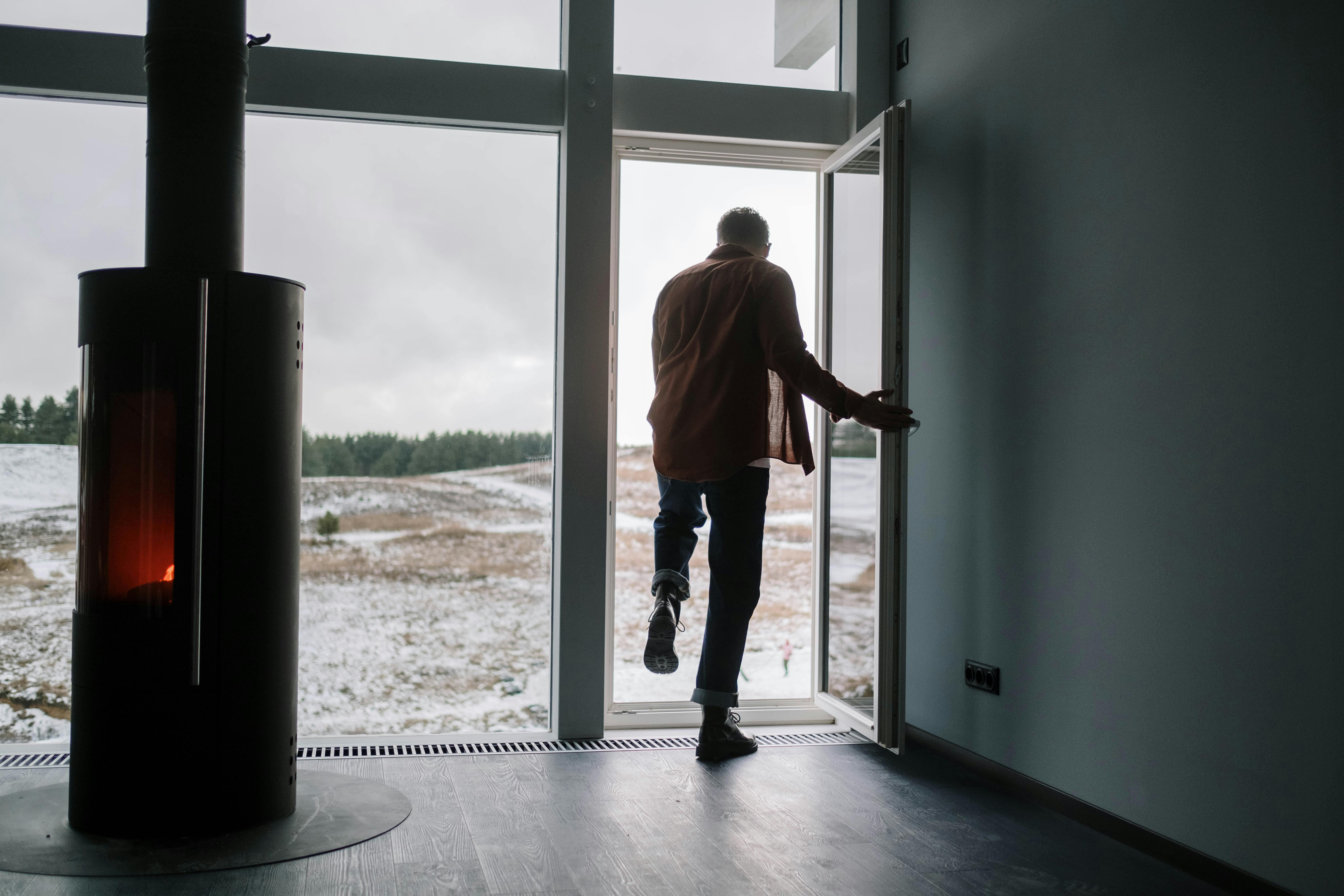A man walking out of the door | Source: Pexels