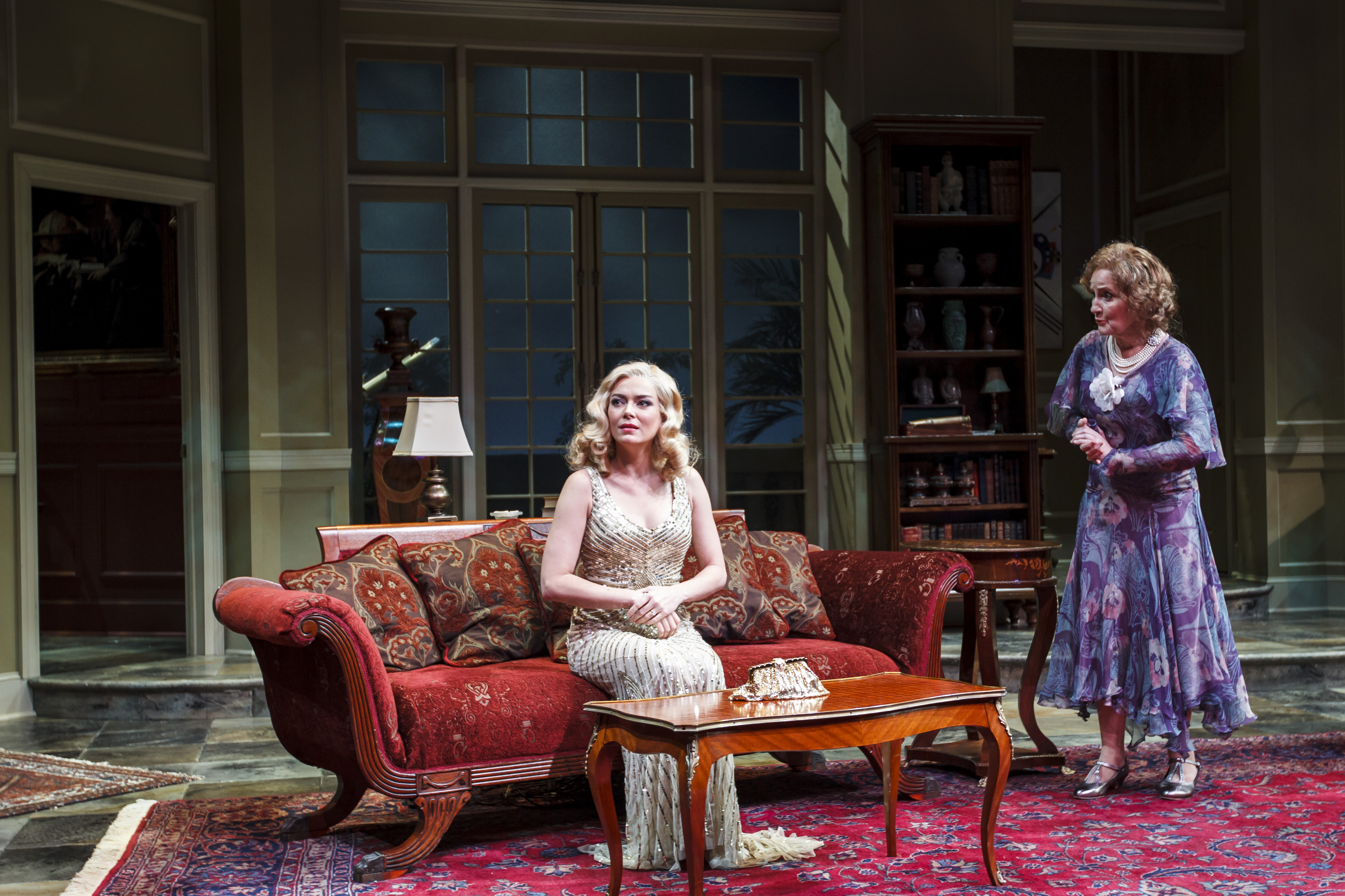 Laura Campbell as Lucia Amory and the actress as Miss Caroline Amory in the Alley Theatre's production of Agatha Christie's mystery "Black Coffee" on July 3, 2012, in Houston, Texas. | Source: Getty Images
