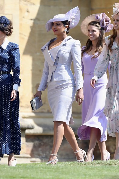 Priyanka Chopra and other guests attend the wedding of Prince Harry to Meghan Markle at St George's Chapel, Windsor Castle on May 19, 2018 in Windsor, England.| Source: Getty Images.