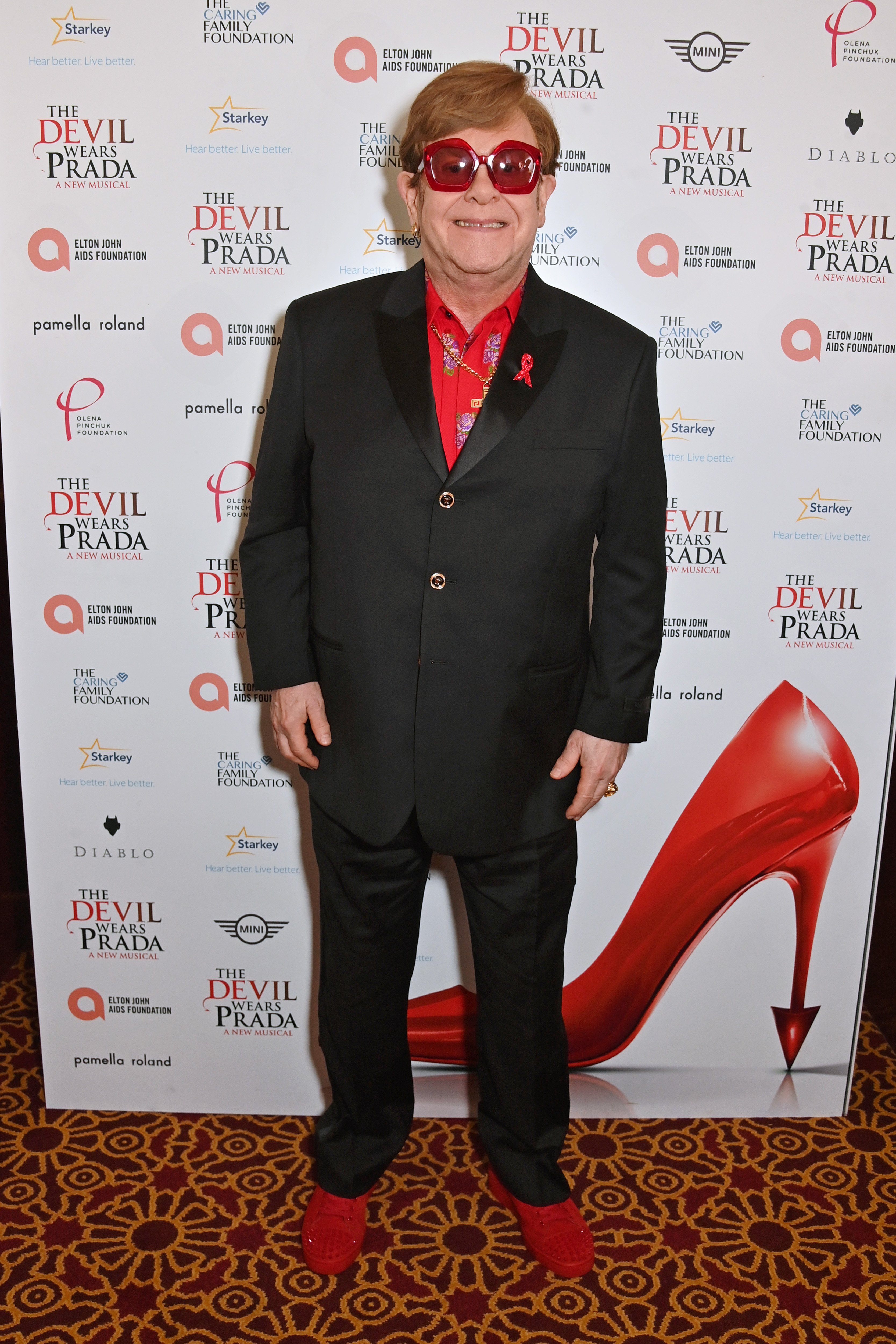 Elton John at "The Devil Wears Prada Musical" charity gala night in support of the Elton John Aids Foundation at The Dominion Theatre on December 1, 2024, in London, England | Source: Getty Images