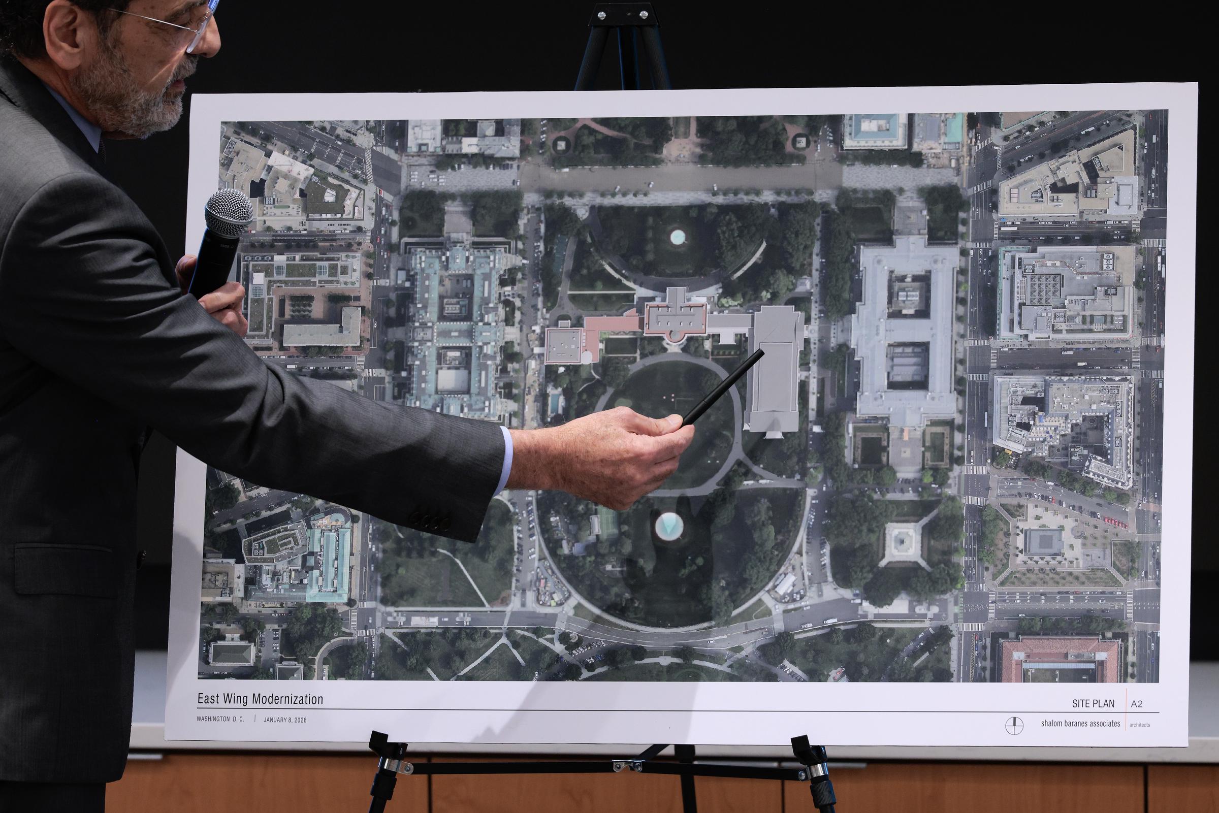Architect Shalom Baranes shows a site plan for a new $400 million ballroom at the White House to members of the National Capital Planning Commission on January 8, 2026, in Washington, DC. | Source: Getty Images