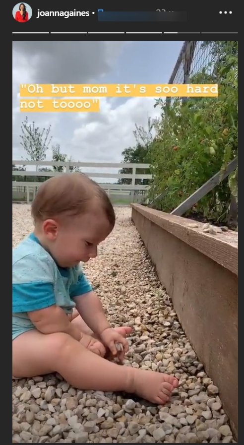 Joanna Gaines' son Crew Gaines playing with stones he'd rather eat | Photo: Instagram Story/Joanna Gaines