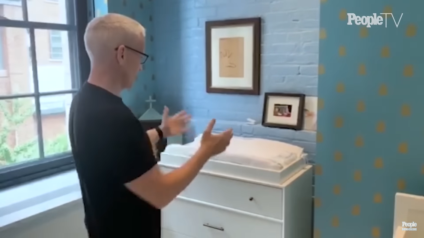 Anderson Cooper shows off the changing area in the nursery | Source: YouTube/PeopleTV