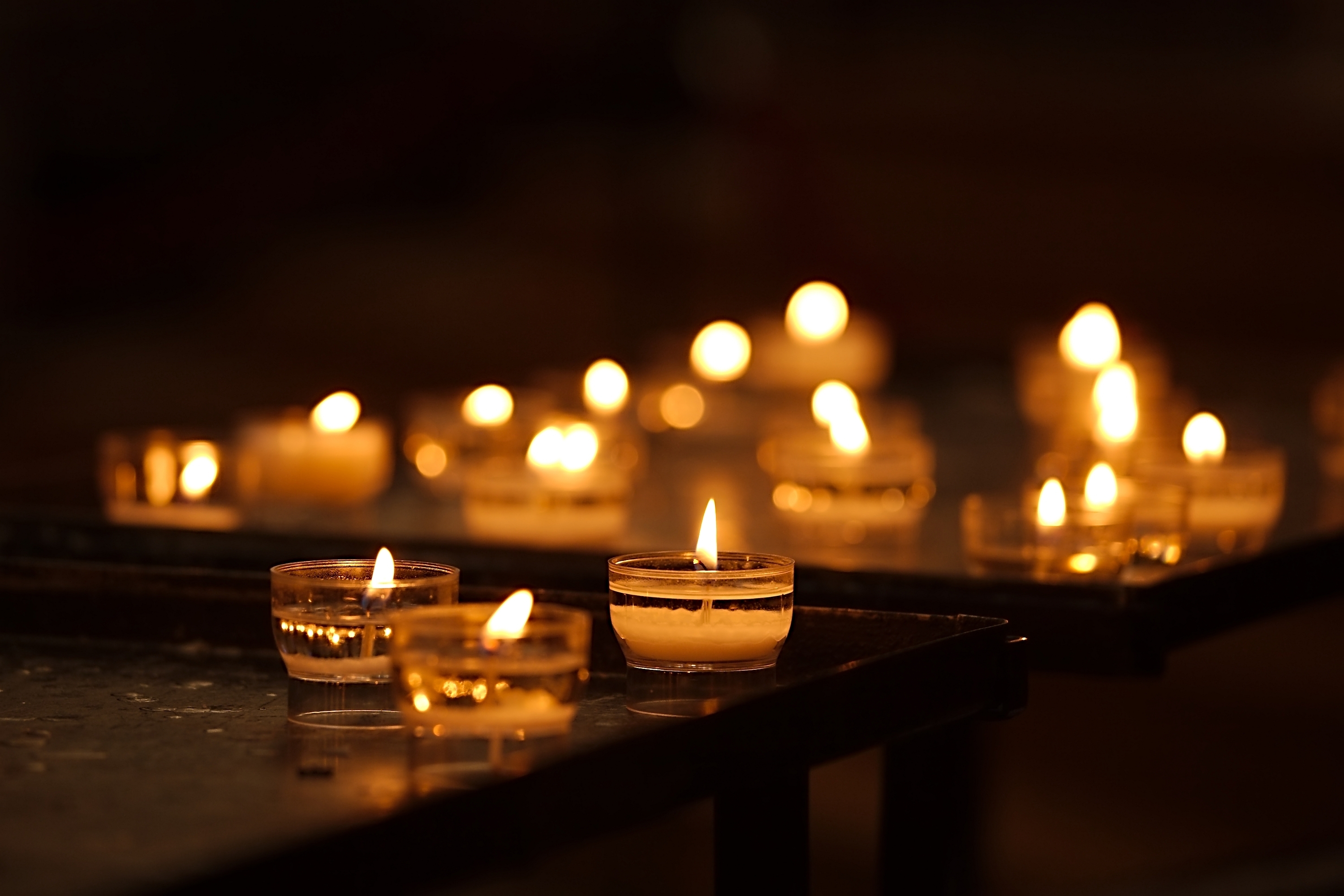 Burning candles | Source: Shutterstock