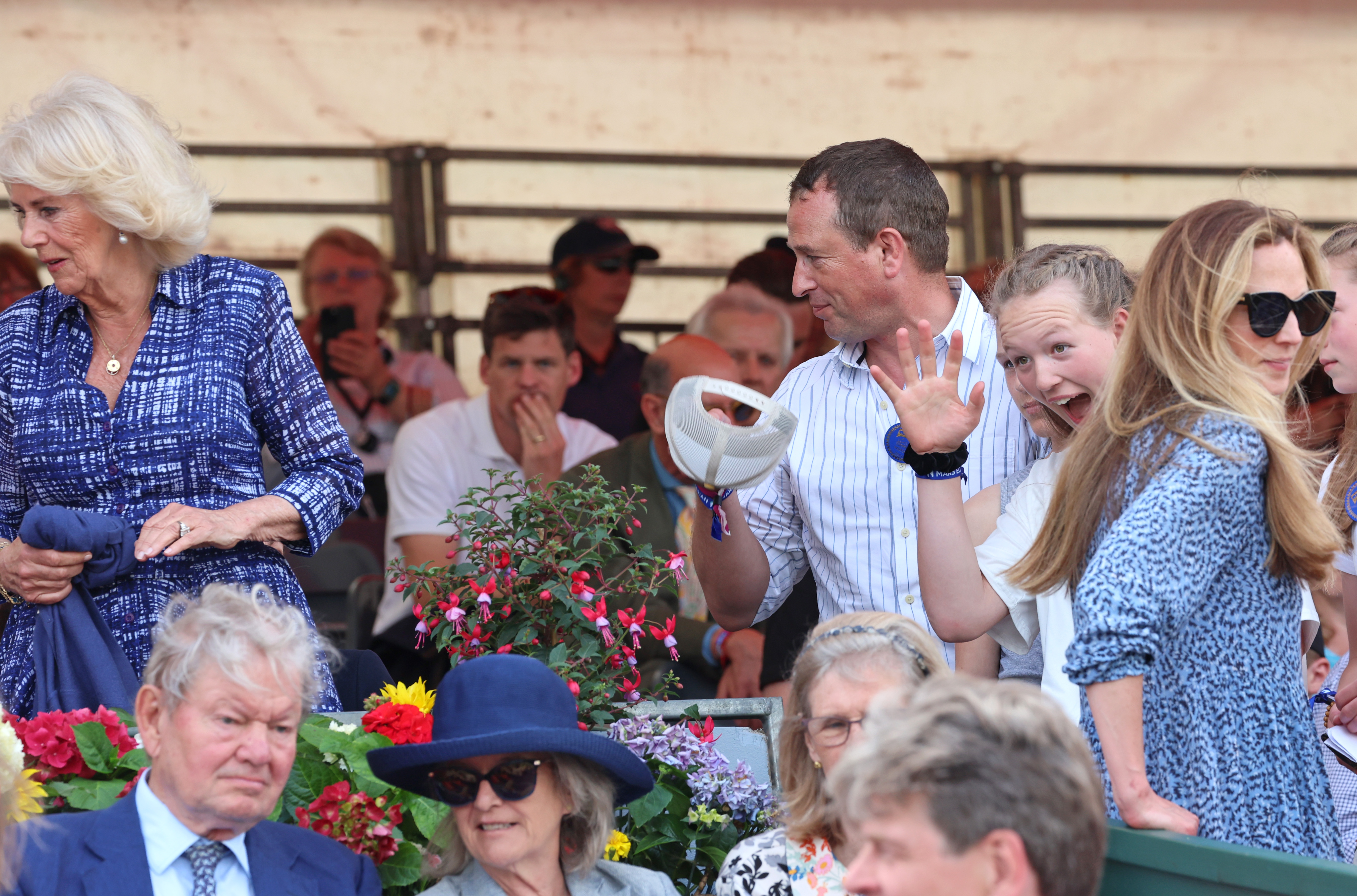 Queen Camilla speaks with Peter Phillips and Harriet Sperling on The Final Day Of The Badminton Horse Trials 2024 at Badminton House on 12 May in Badminton, Gloucestershire. | Source: Getty Images