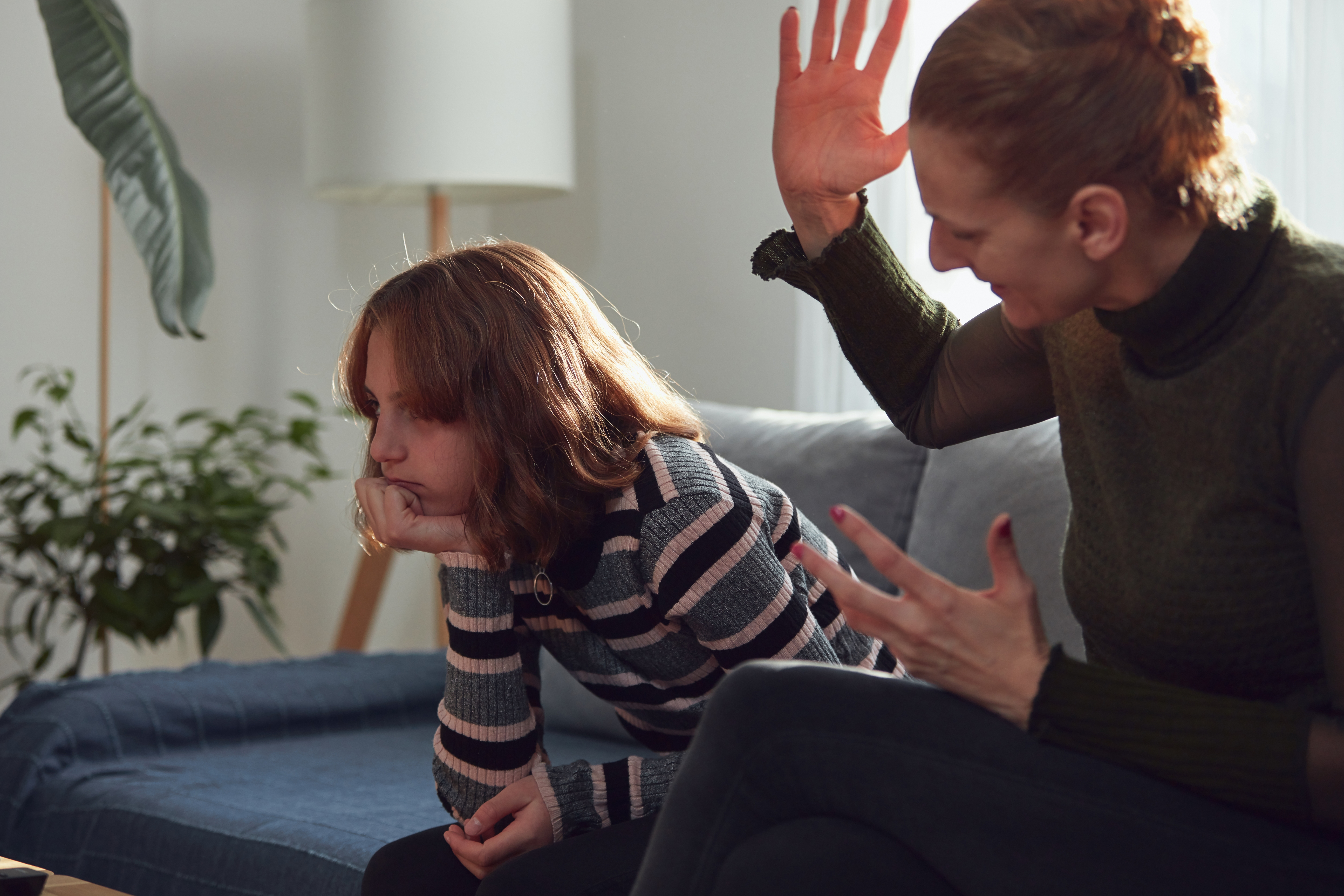 A woman scolding a child | Source: Shutterstock