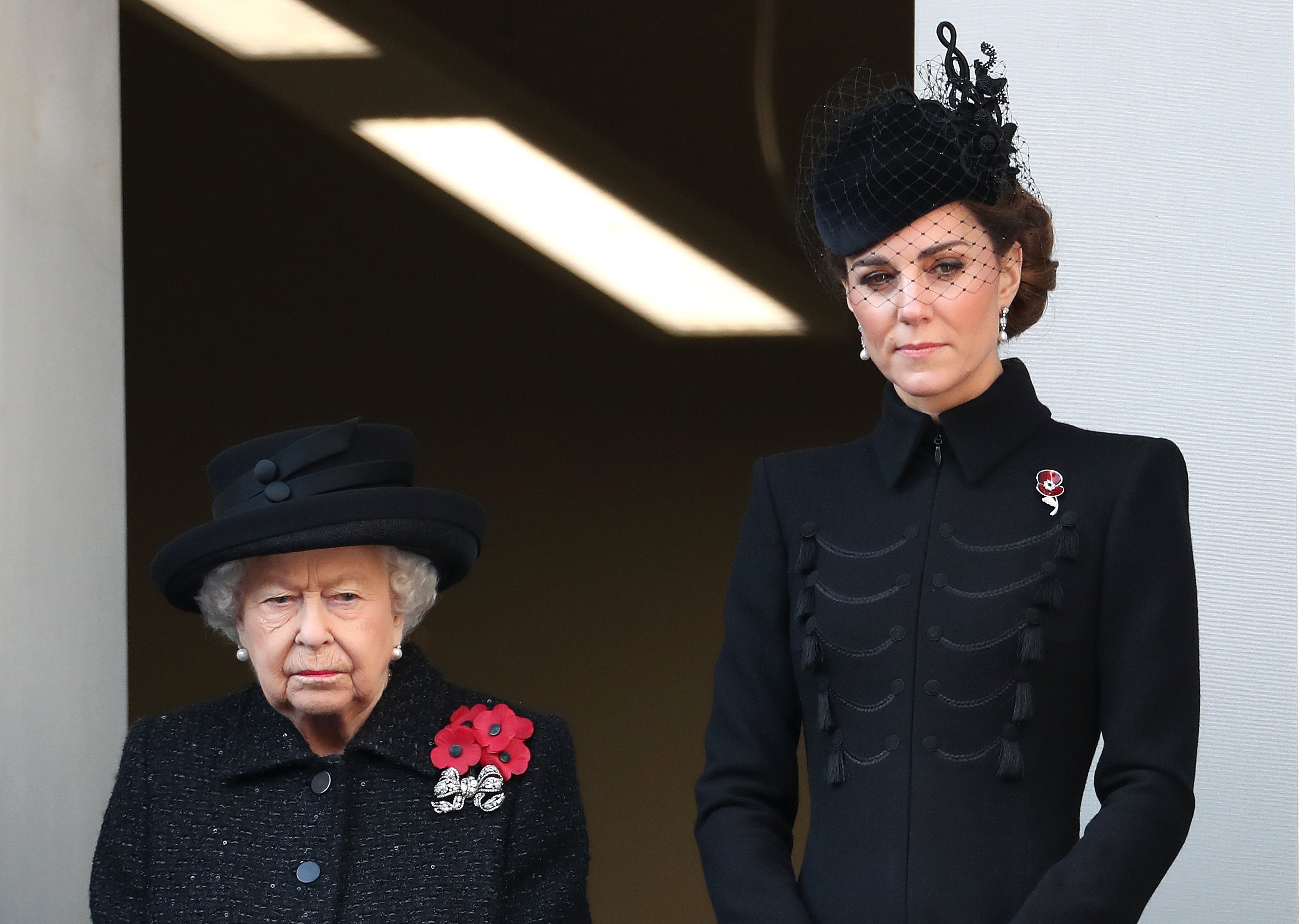 Kate Middleton standing next to Queen Elizabeth at the annual Remembrance Sunday memorial at The Cenotaph in London, England