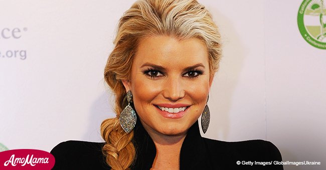 Jessica Simpson flaunts ample cleavage in revealing silk dress during her recent appearance