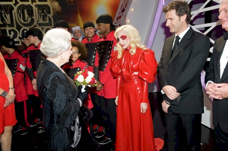 BLACKPOOL, UNITED KINGDOM - DECEMBER 7: Queen Elizabeth II meets singer Lady Gaga following the Royal Variety Performance on December 7, 2009 in Blackpool, England (Photo by Leon Neal/ WPA Pool /Getty Images)