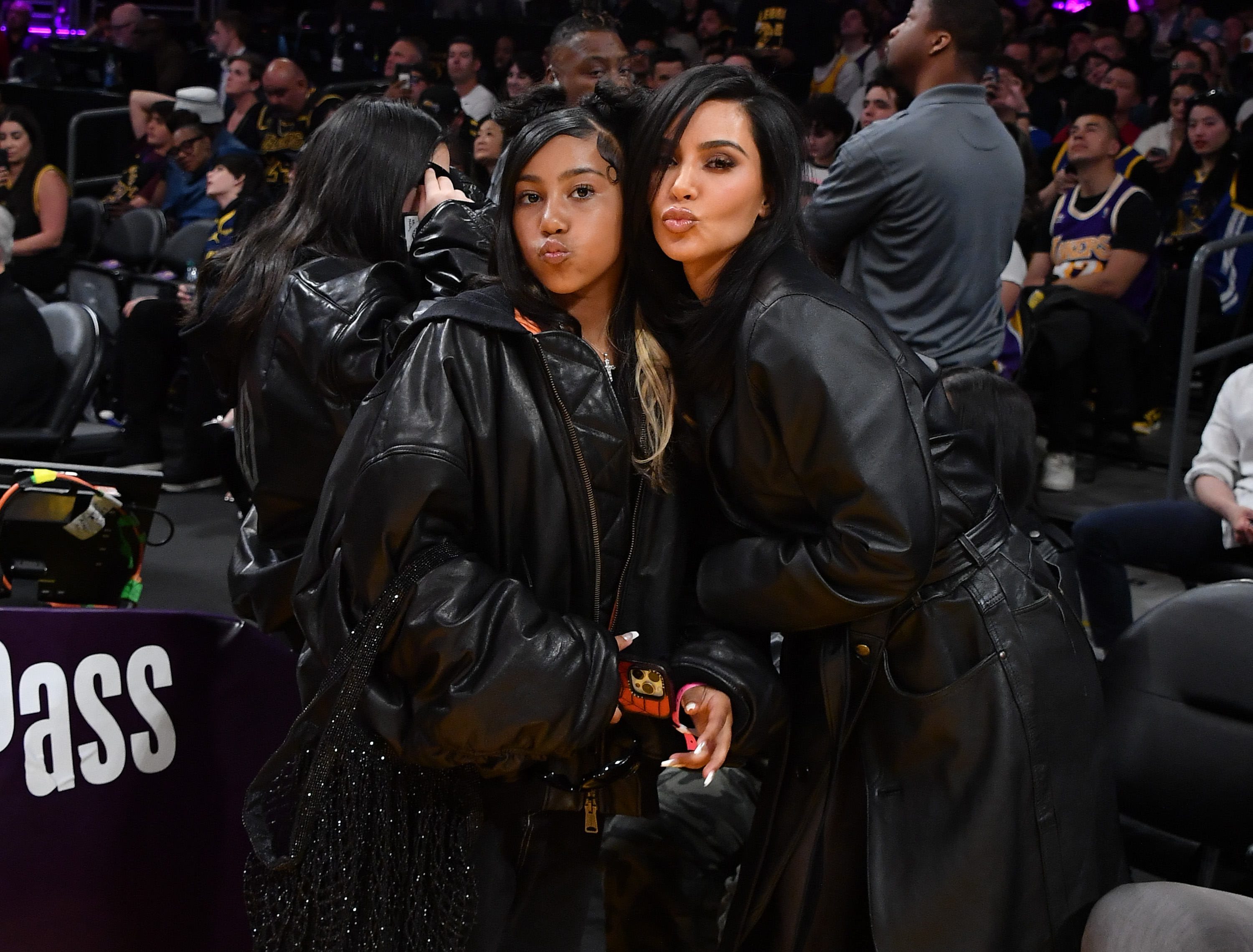 North West and Kim Kardashian at a basketball game between the Los Angeles Lakers and the Golden State Warriors in Los Angeles, California on April 9, 2024. | Source: Getty Images