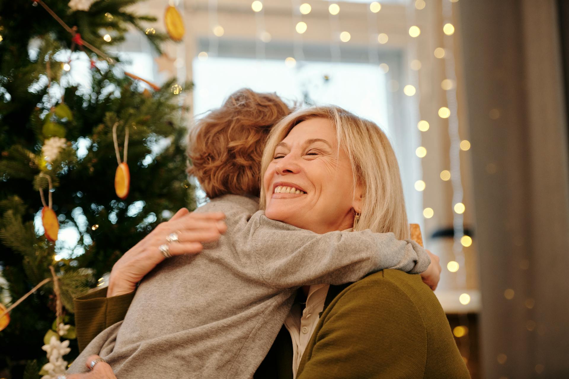 A grandmother hugging her grandson | Source: Pexels