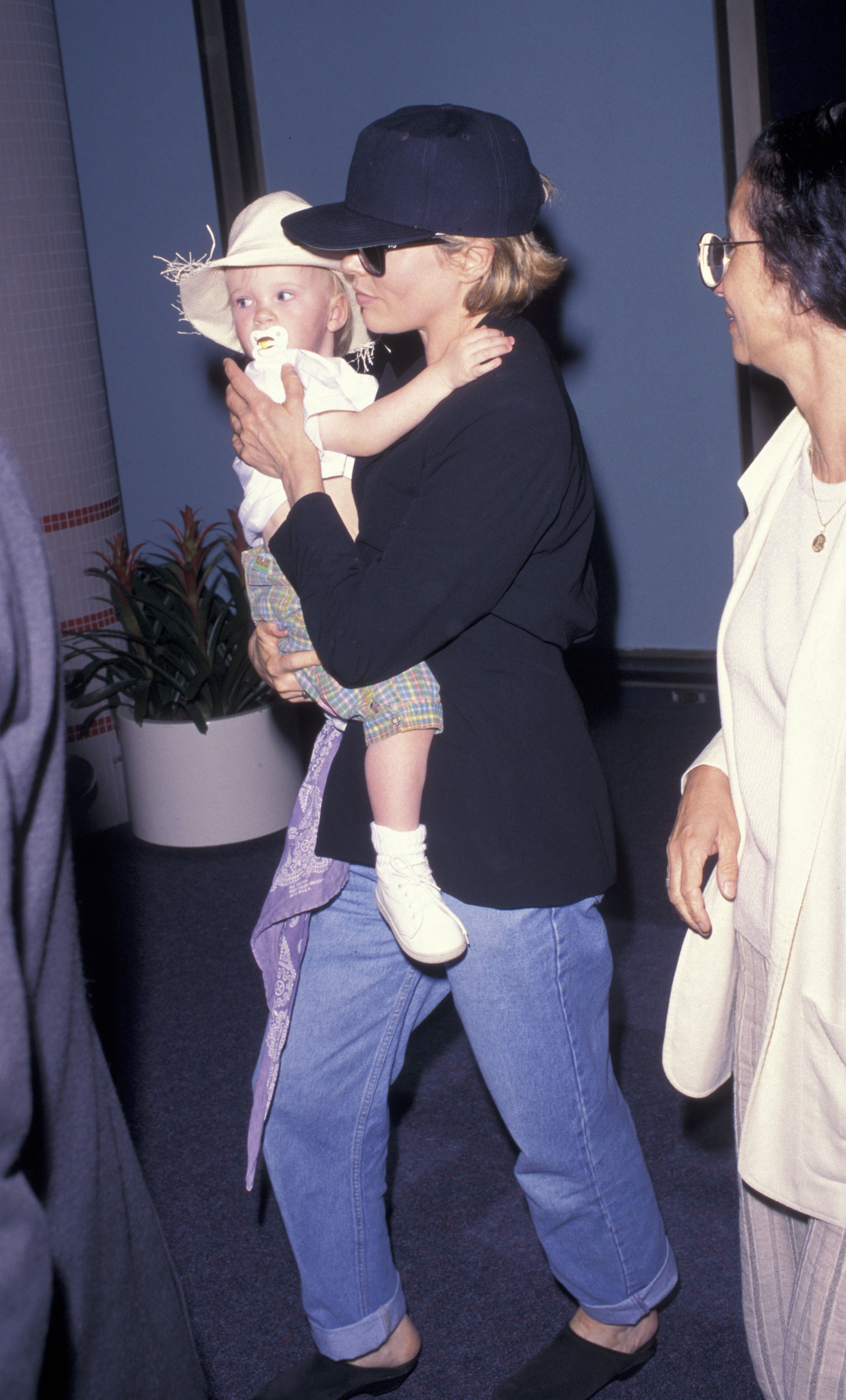 Kim Basinger and baby Ireland Baldwin at the Los Angeles International Airport on July 12, 1997 | Source: Getty Images