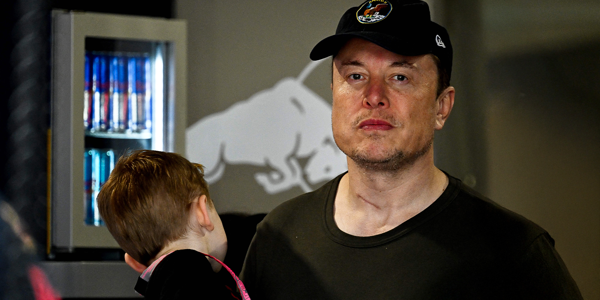 Elon Musk holding his child, 2023 | Source: Getty Images