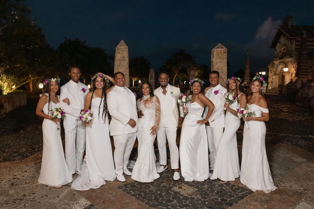Blake and Blair Underwood join family members at Casa de Campo Resort & Villas, posing together during a wedding celebration, in coordinated white attire. | Source: Instagram/blairunderwood_official