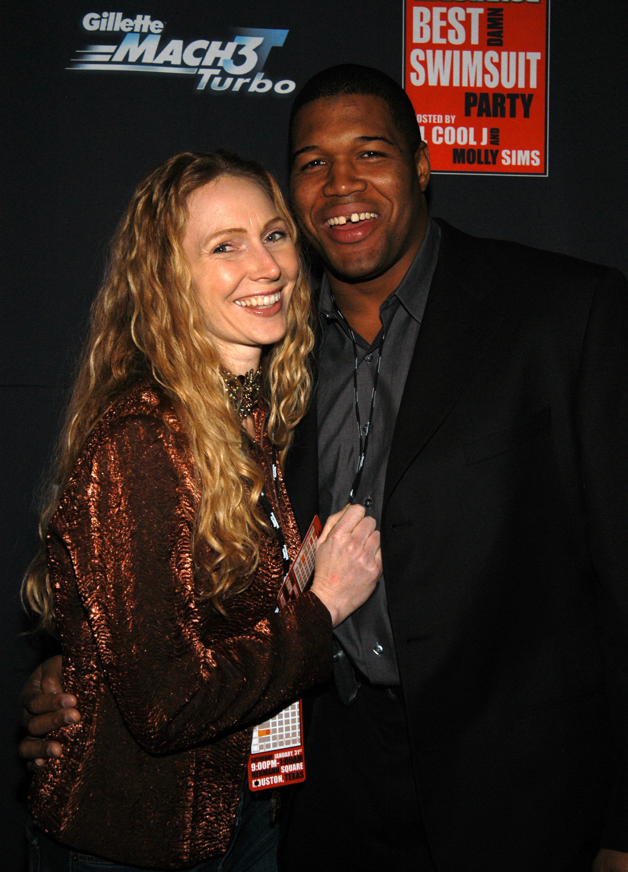 Jean Muggli and Michael Strahan at the SuperBowl XXXVIII - Gillette/Sports Illustrated Party on January 31, 2004 | Source: Getty Images