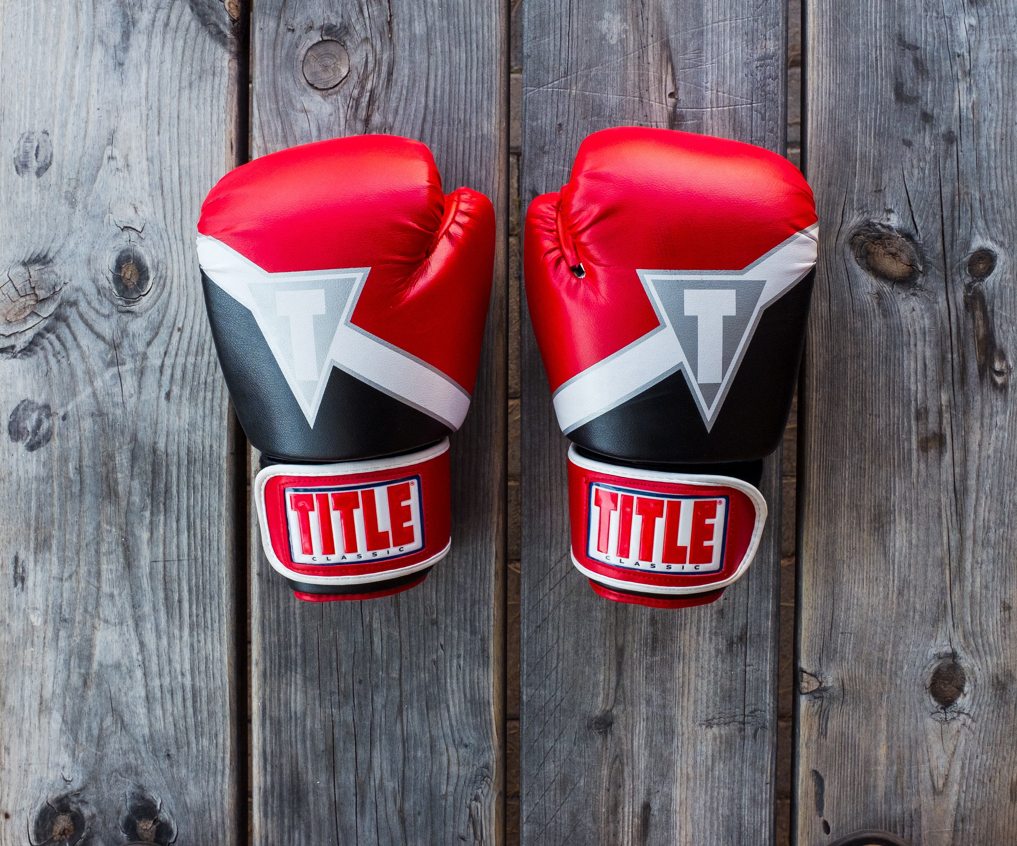 Pair of boxing gloves | Source: Unsplash / NeONBRAND