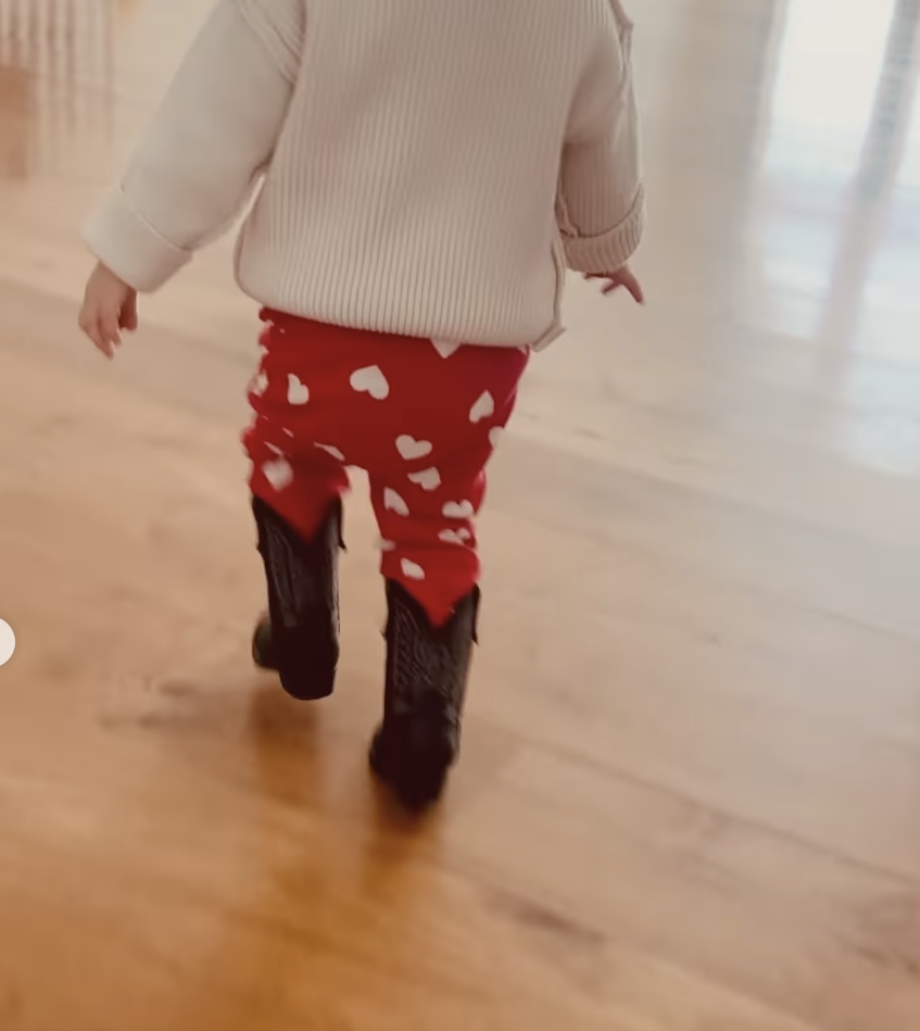 Wynonna Judd's granddaughter, Kaliyah, walking around in cowboy boots as seen in an Instagram carousel dated January 2024 | Source: Instagram.com/wynonnajudd/