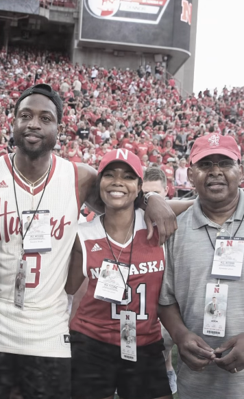 Dwayne Wade, Gabrielle and Cully Union at a football game, from a post dated April 4, 2026 | Source: Instagram/gabunion